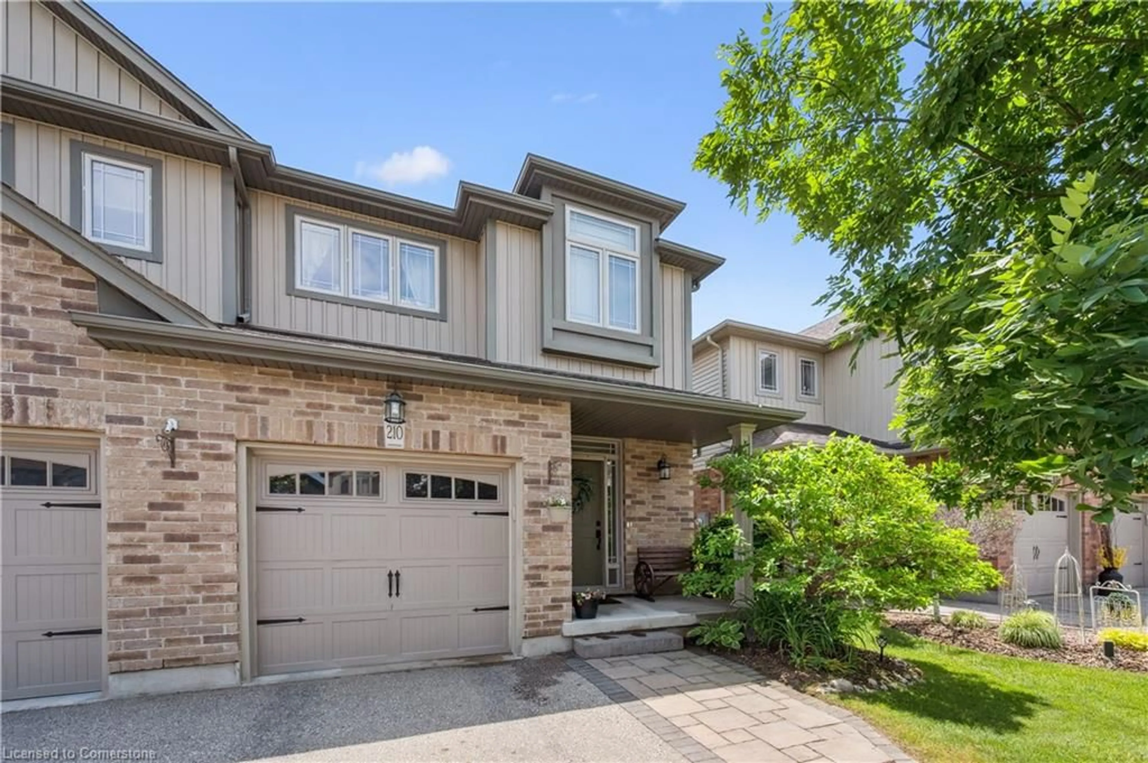 Home with brick exterior material, street for 210 Couling Cres, Guelph Ontario N1E 0L4