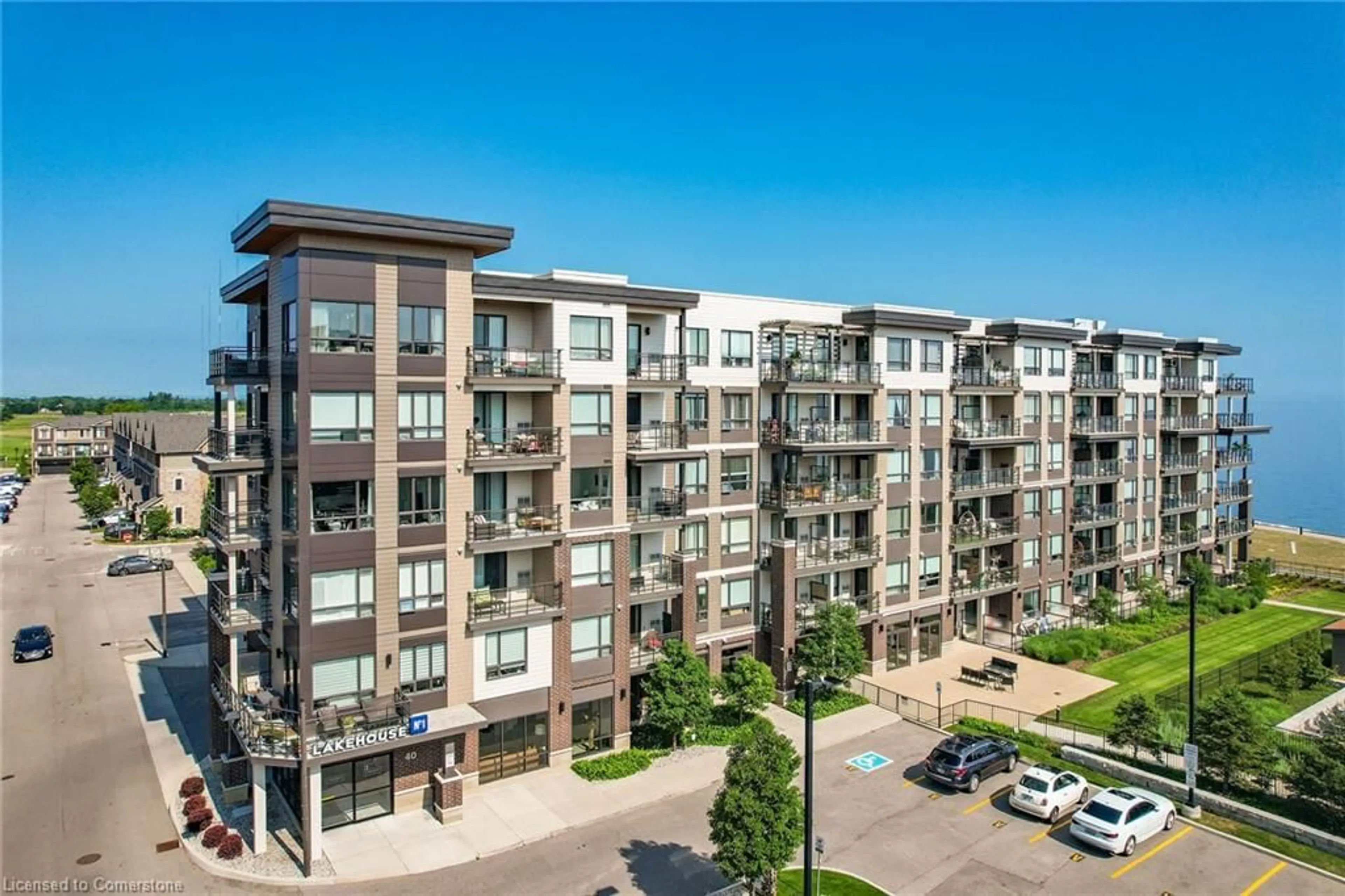 A pic from outside/outdoor area/front of a property/back of a property/a pic from drone, city buildings view from balcony for 40 Esplanade Lane #409, Grimsby Ontario L3M 0G9