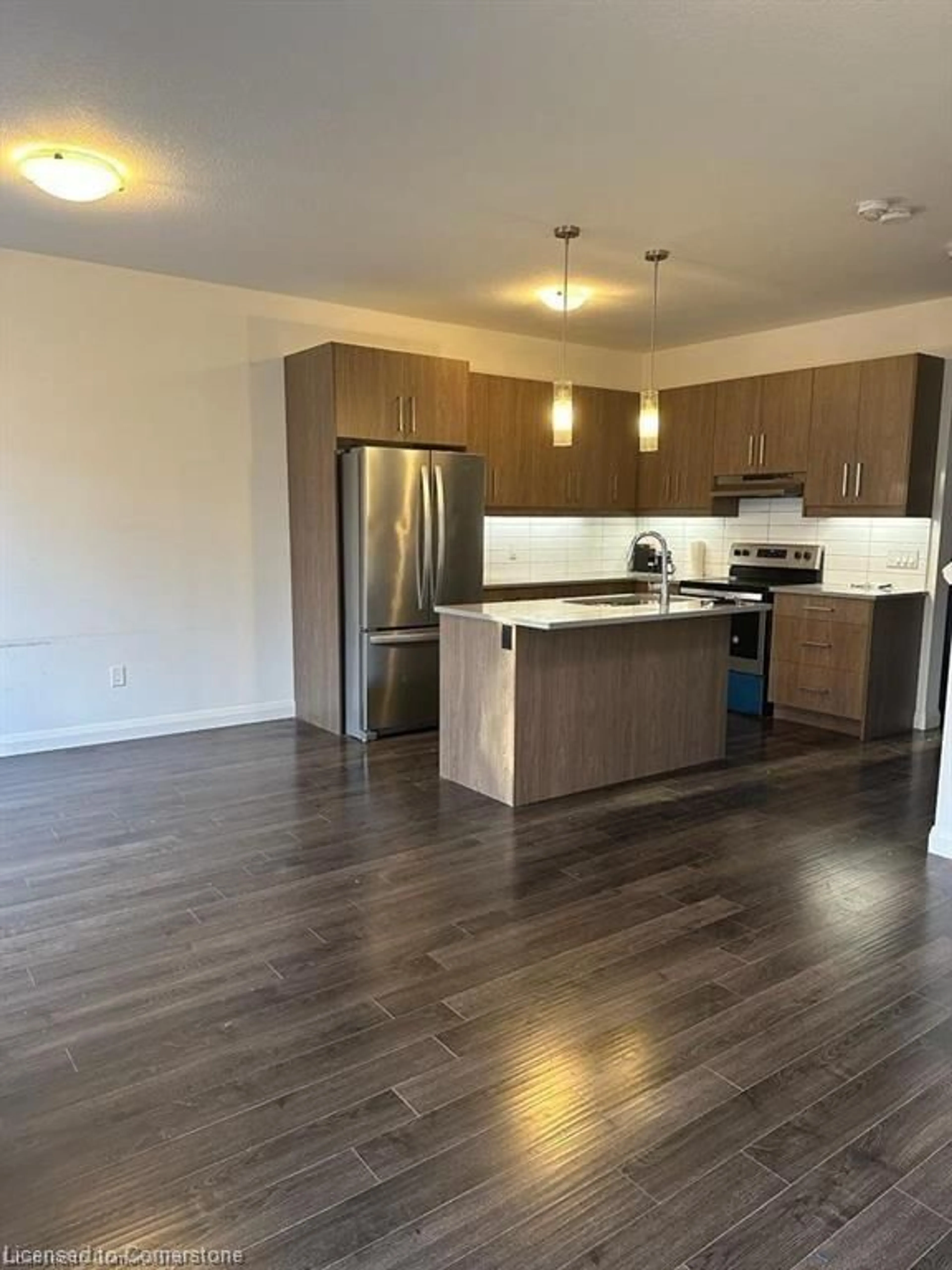 Open concept kitchen, wood/laminate floor for 3260 Singleton Ave, London Ontario N6L 0E7