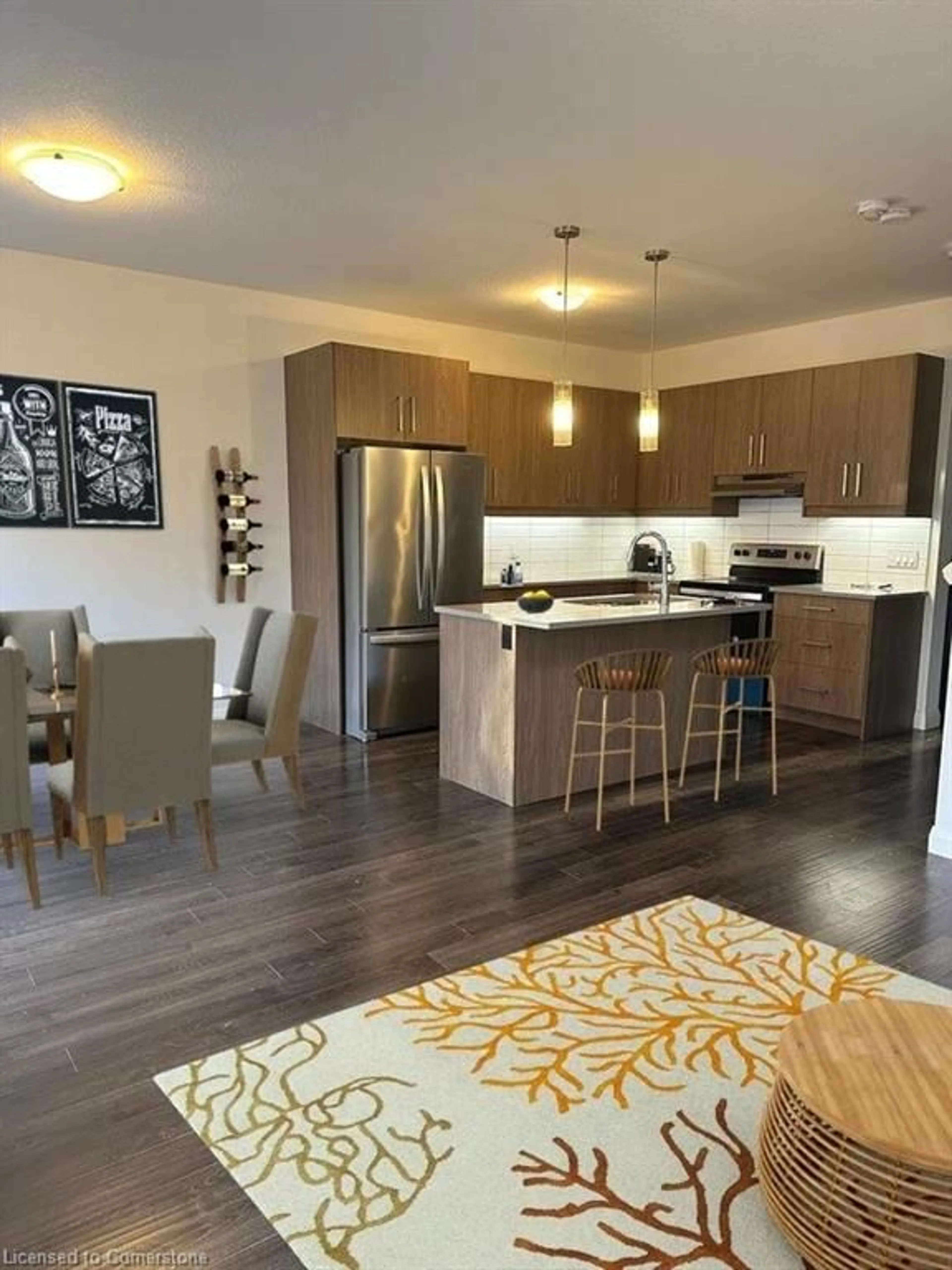 Open concept kitchen, wood/laminate floor for 3260 Singleton Ave, London Ontario N6L 0E7