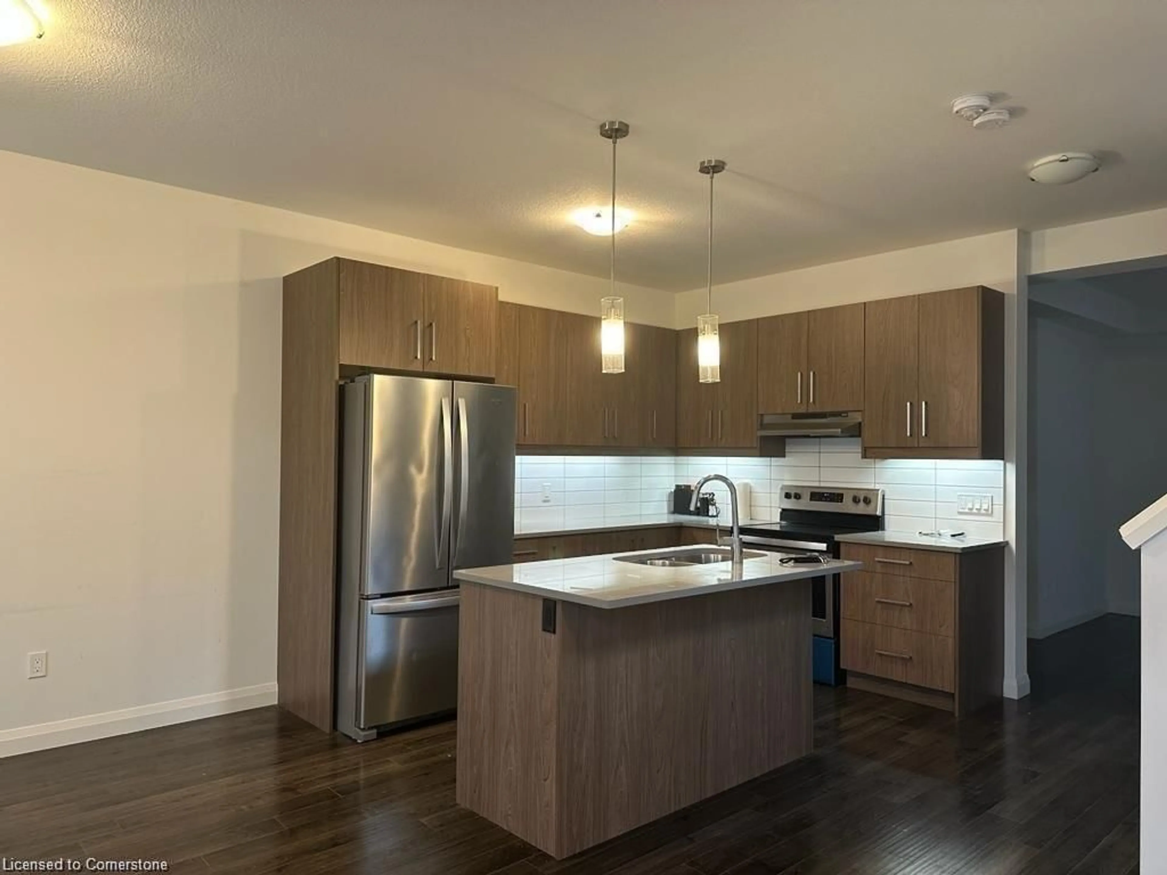 Open concept kitchen, wood/laminate floor for 3260 Singleton Ave, London Ontario N6L 0E7