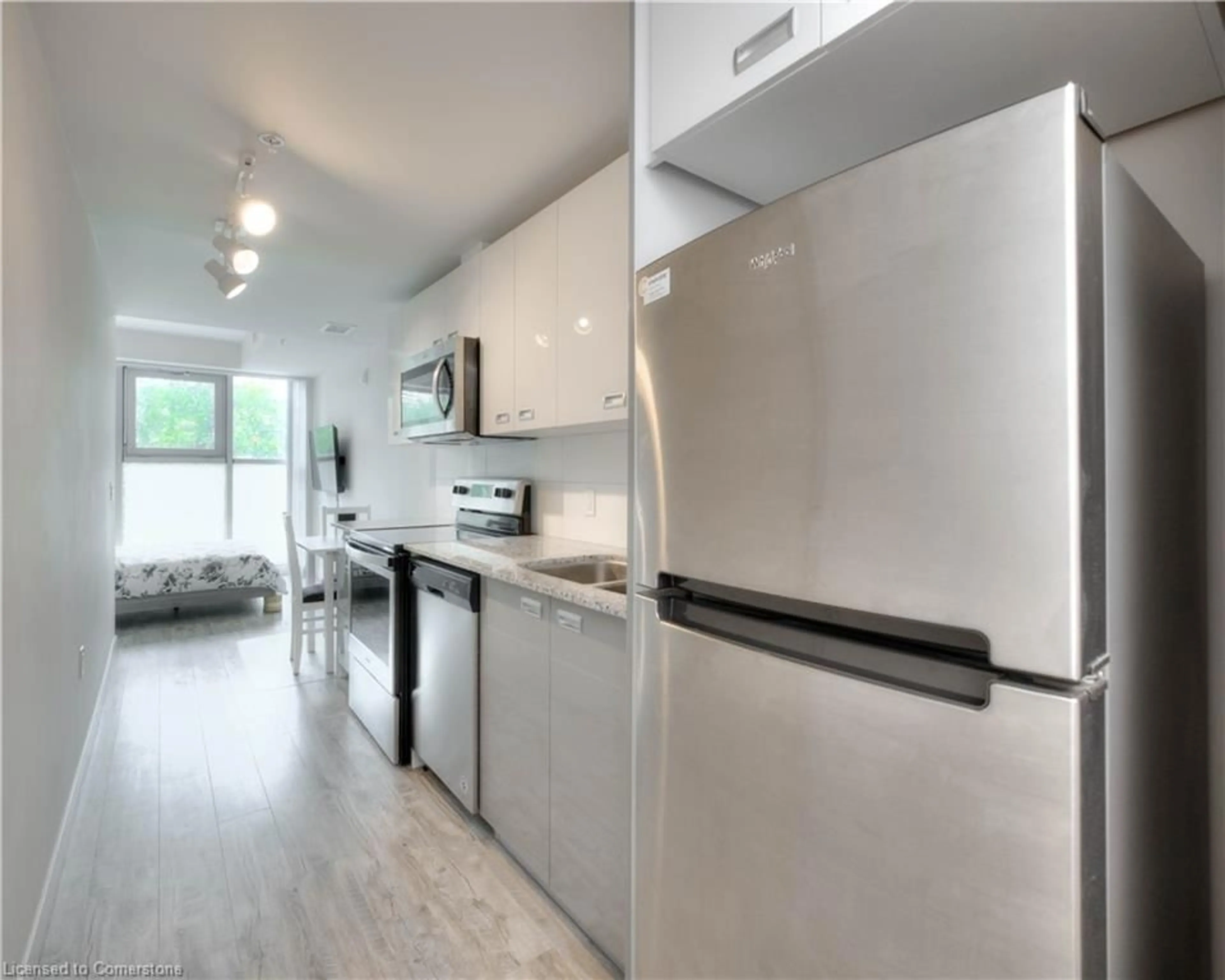 Kitchen with laundary machines, unknown for 257 Hemlock St #415, Waterloo Ontario N2L 0K2