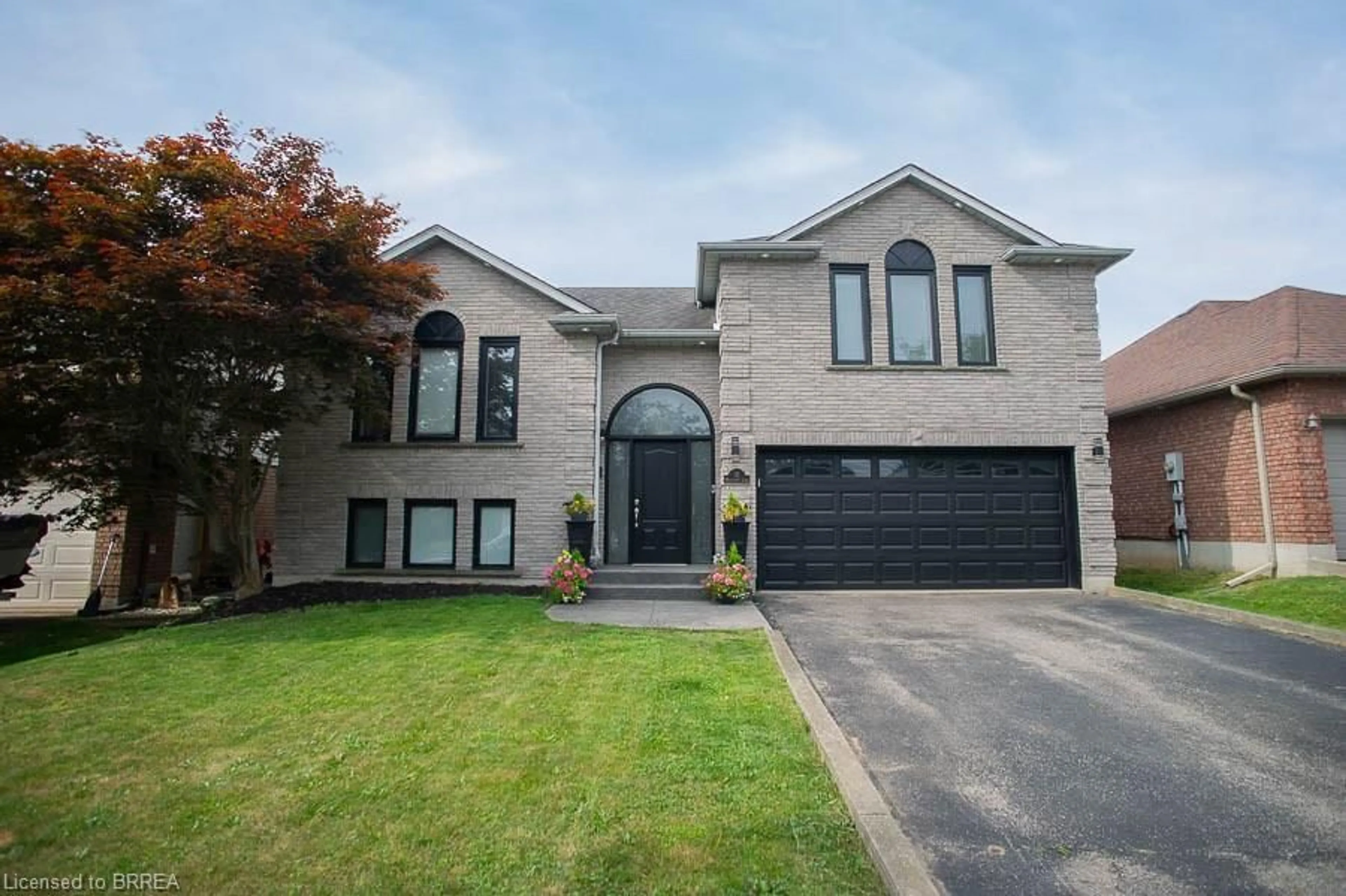 Home with brick exterior material, street for 11 Maplecrest Lane, Brantford Ontario N3R 7V1
