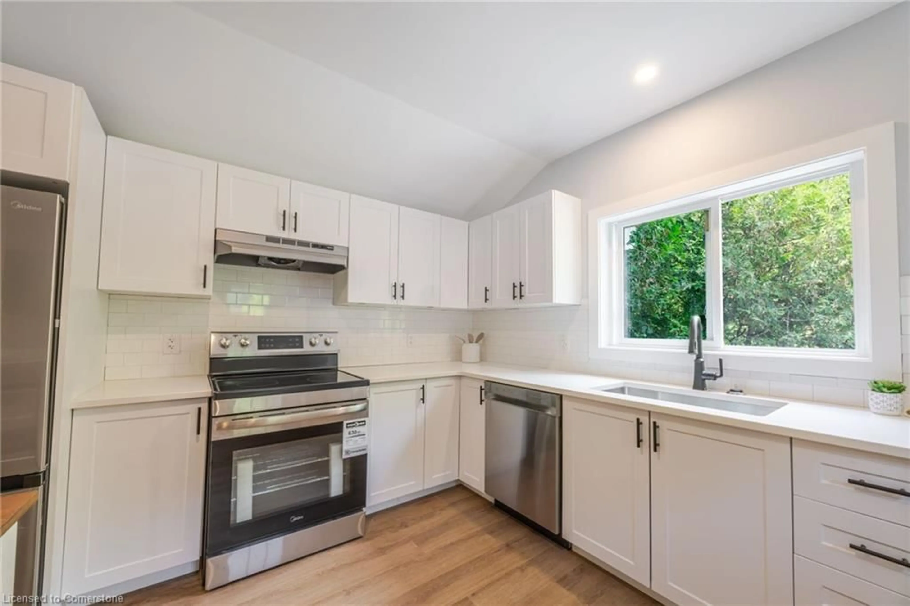 Open concept kitchen, unknown for 277 Charlotte St, Port Stanley Ontario N5L 1A8