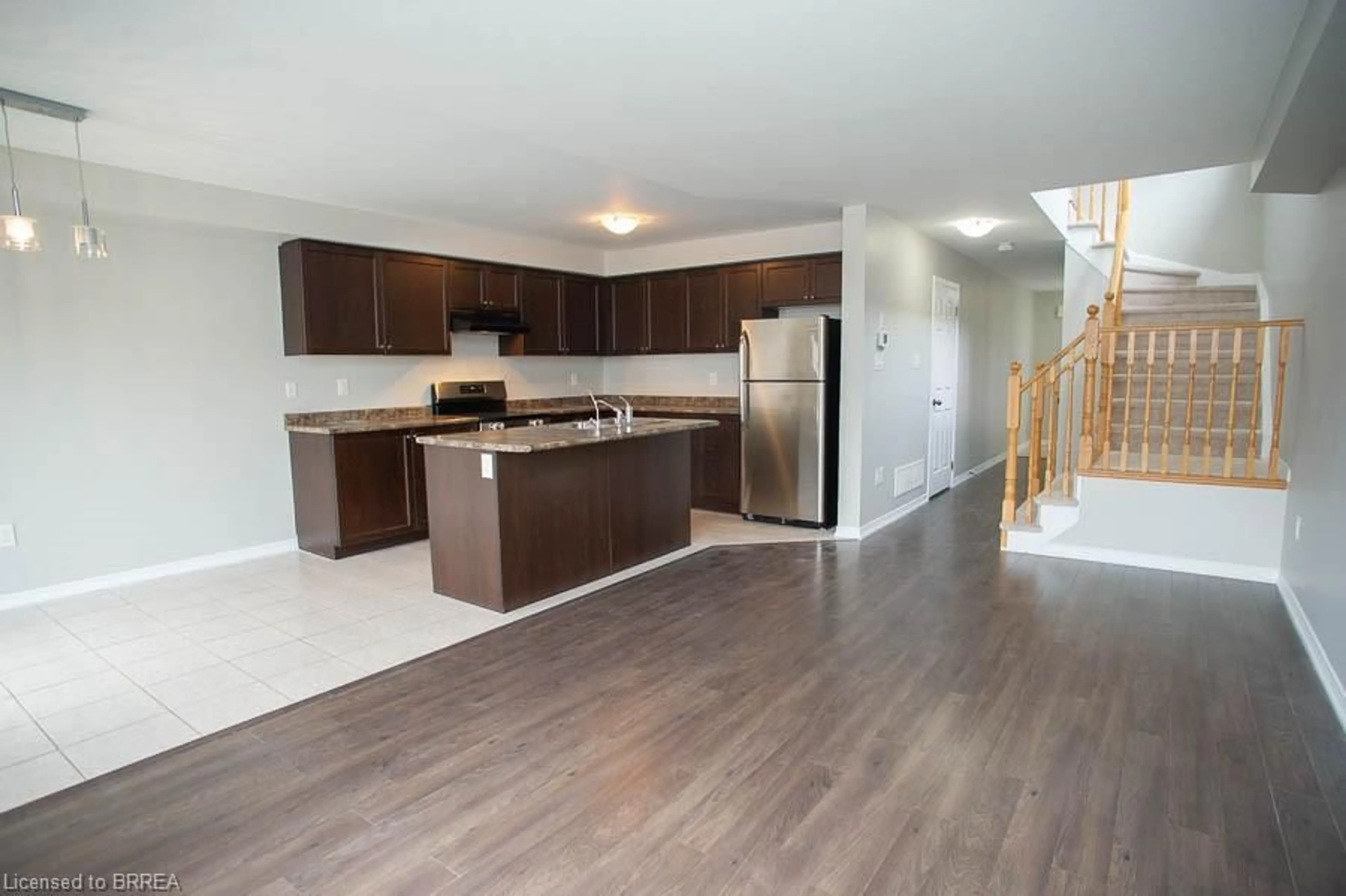 Open concept kitchen, wood/laminate floor for 267 Powell Rd, Brantford Ontario N3T 0J6