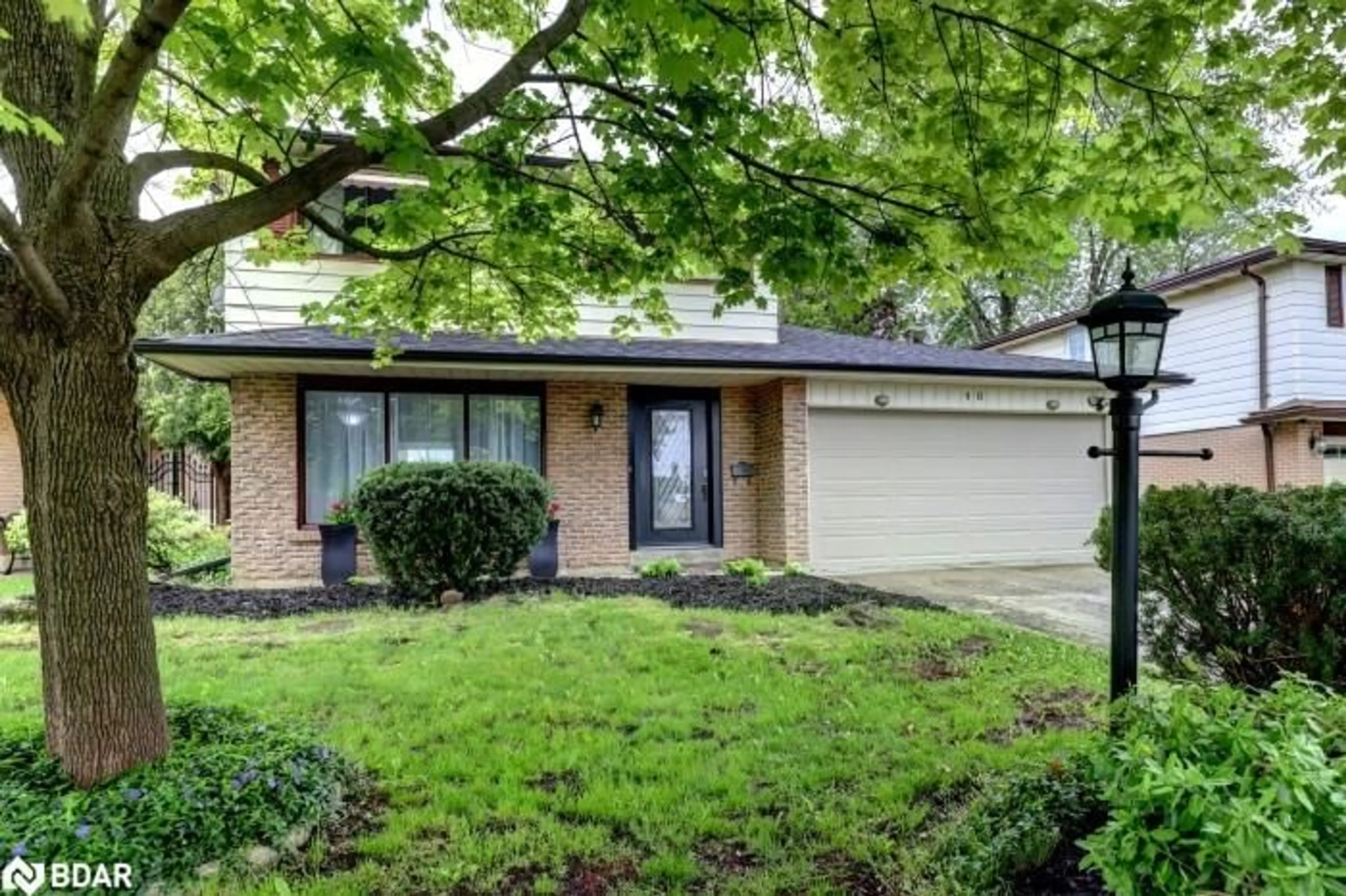 Home with vinyl exterior material, street for 46 Bartley Bull Pky, Brampton Ontario L6W 2J4