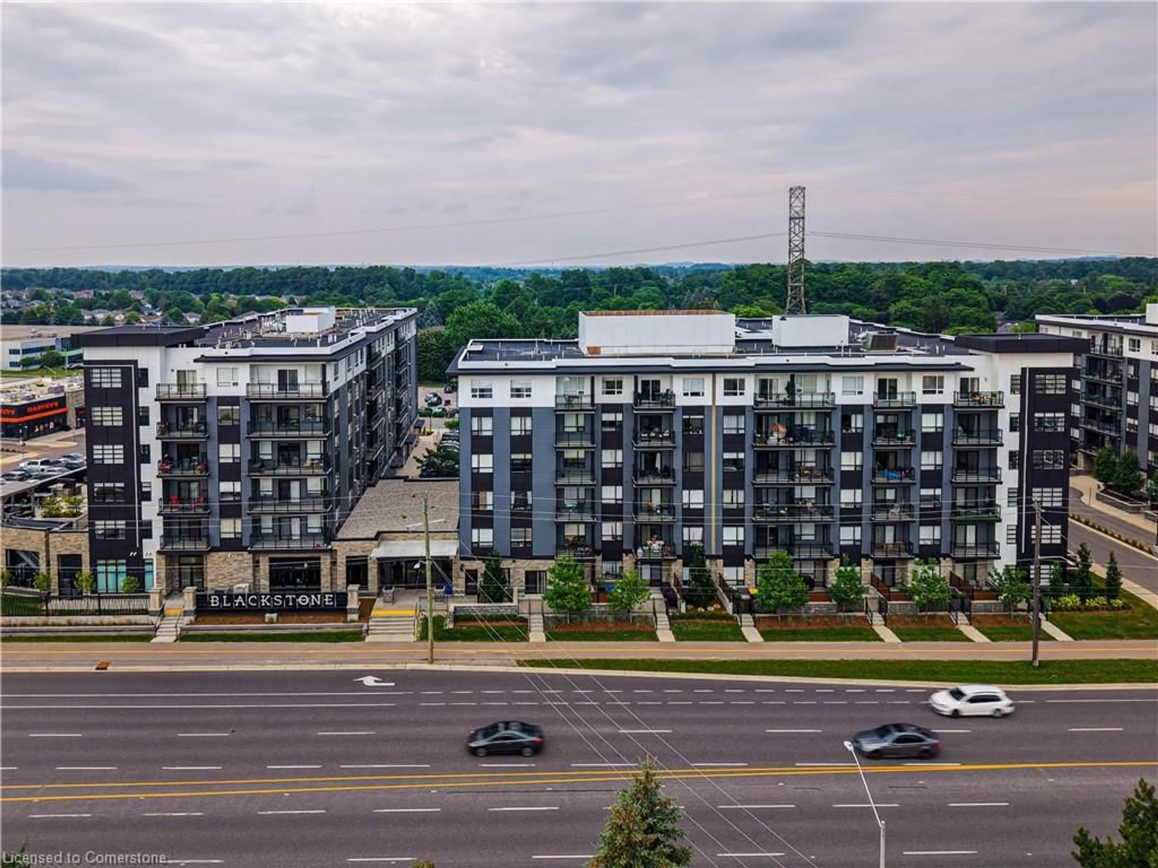 A pic from outside/outdoor area/front of a property/back of a property/a pic from drone, city buildings view from balcony for 251 Northfield Dr #205, Waterloo Ontario N2K 3H4