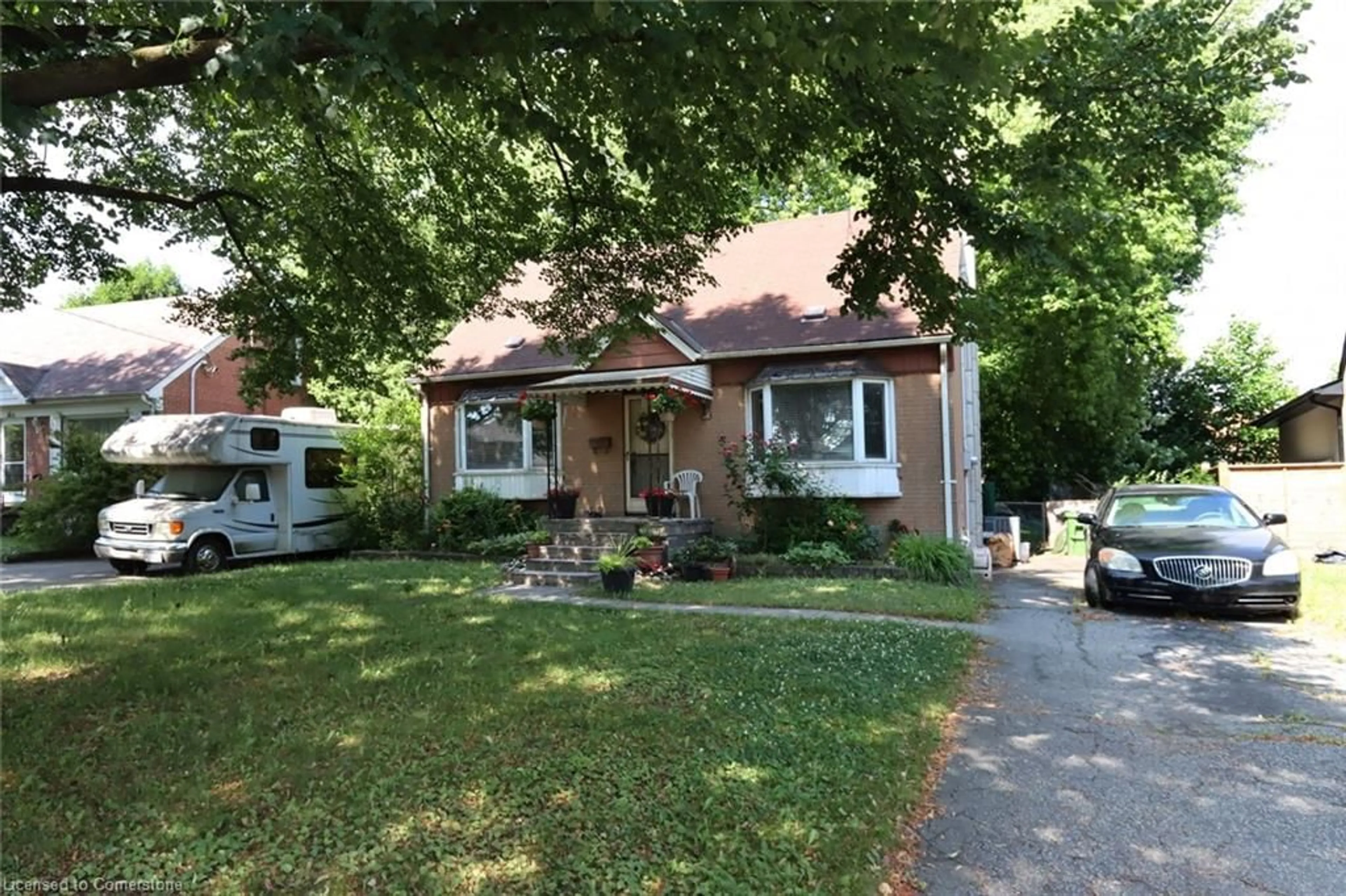 Home with brick exterior material, street for 26 Ann Arbour Rd, Toronto Ontario M9M 2J6