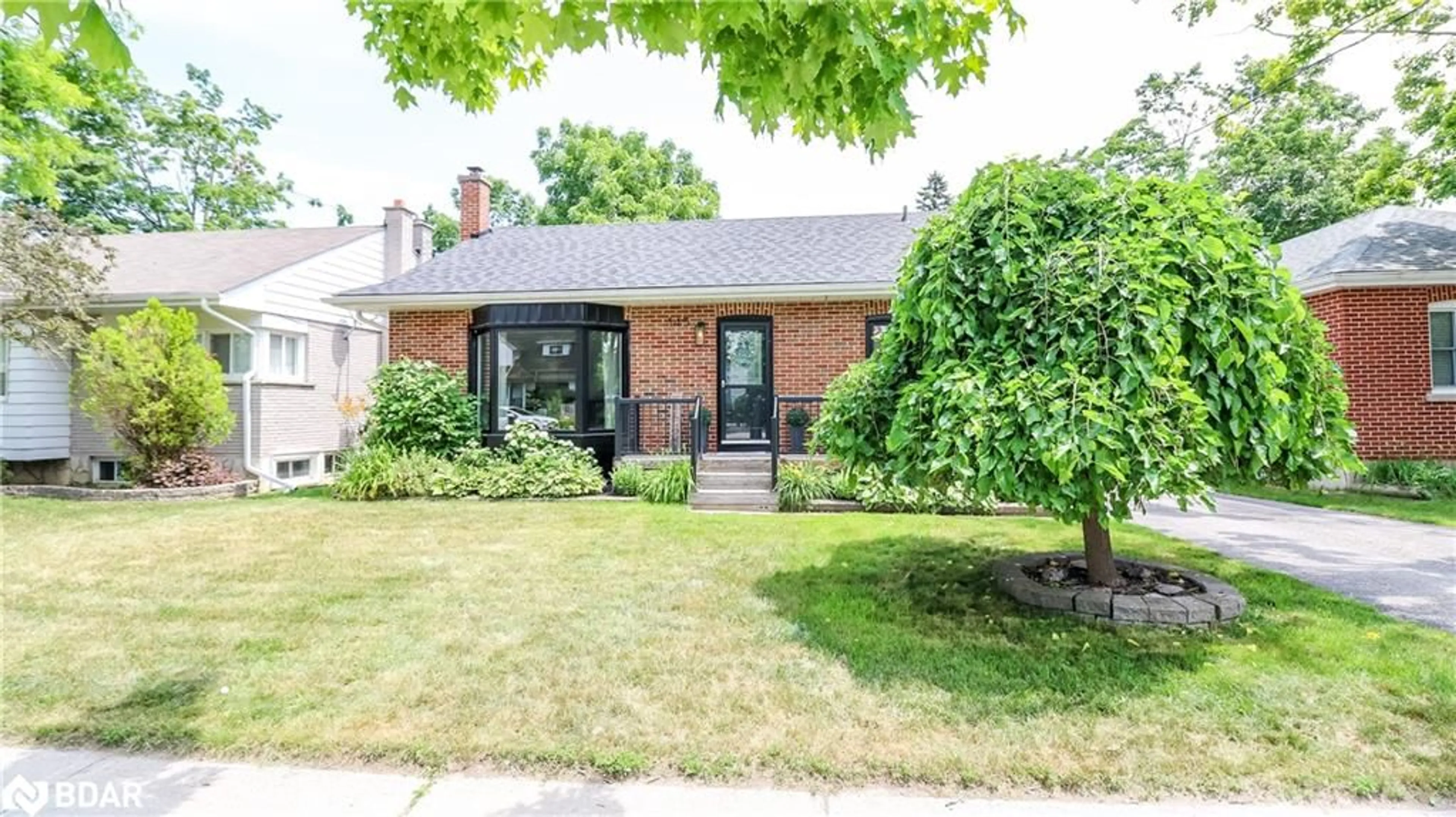 Home with brick exterior material, street for 145 Cook St, Barrie Ontario L4M 4H1