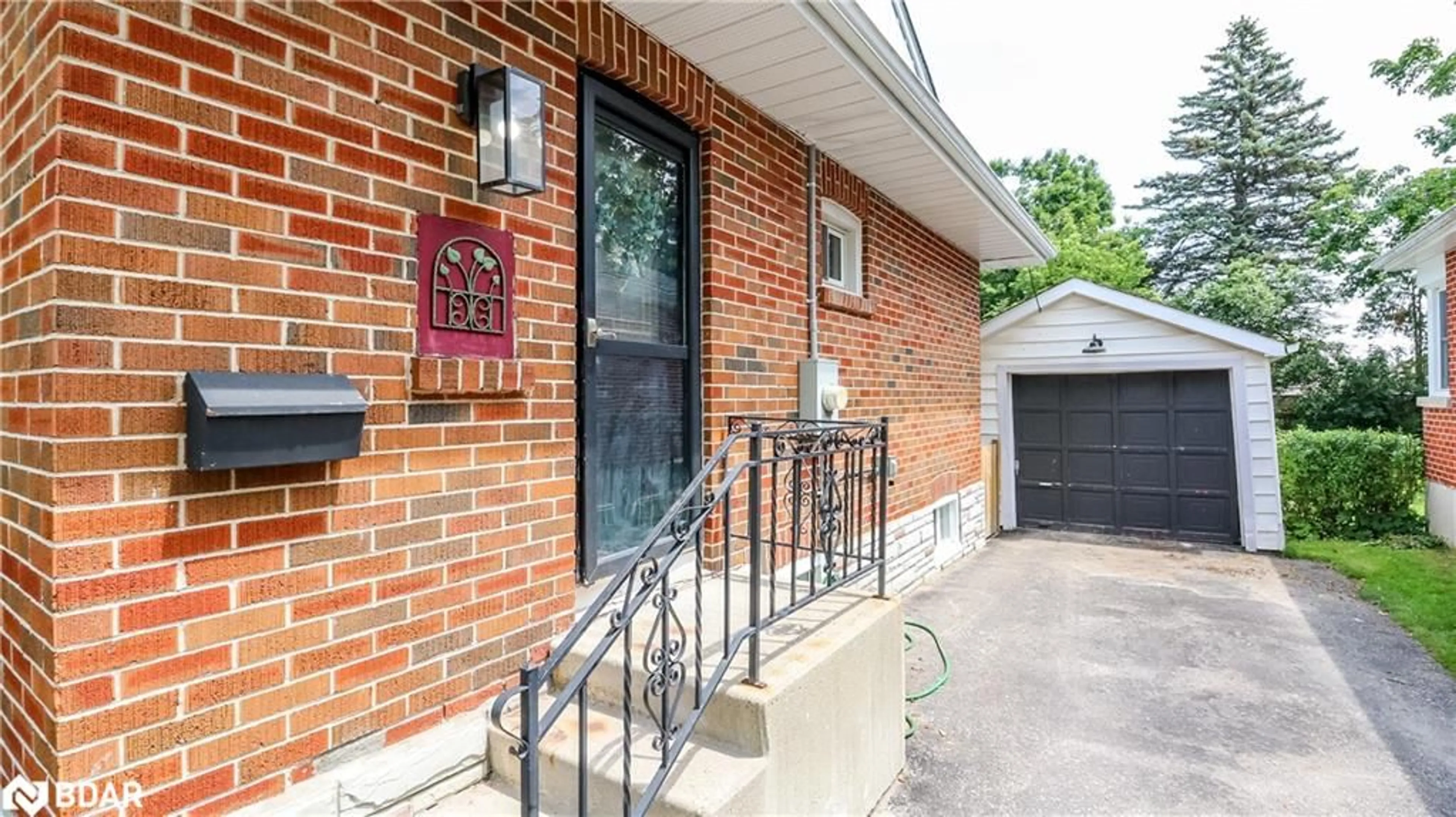 Home with brick exterior material, street for 145 Cook St, Barrie Ontario L4M 4H1