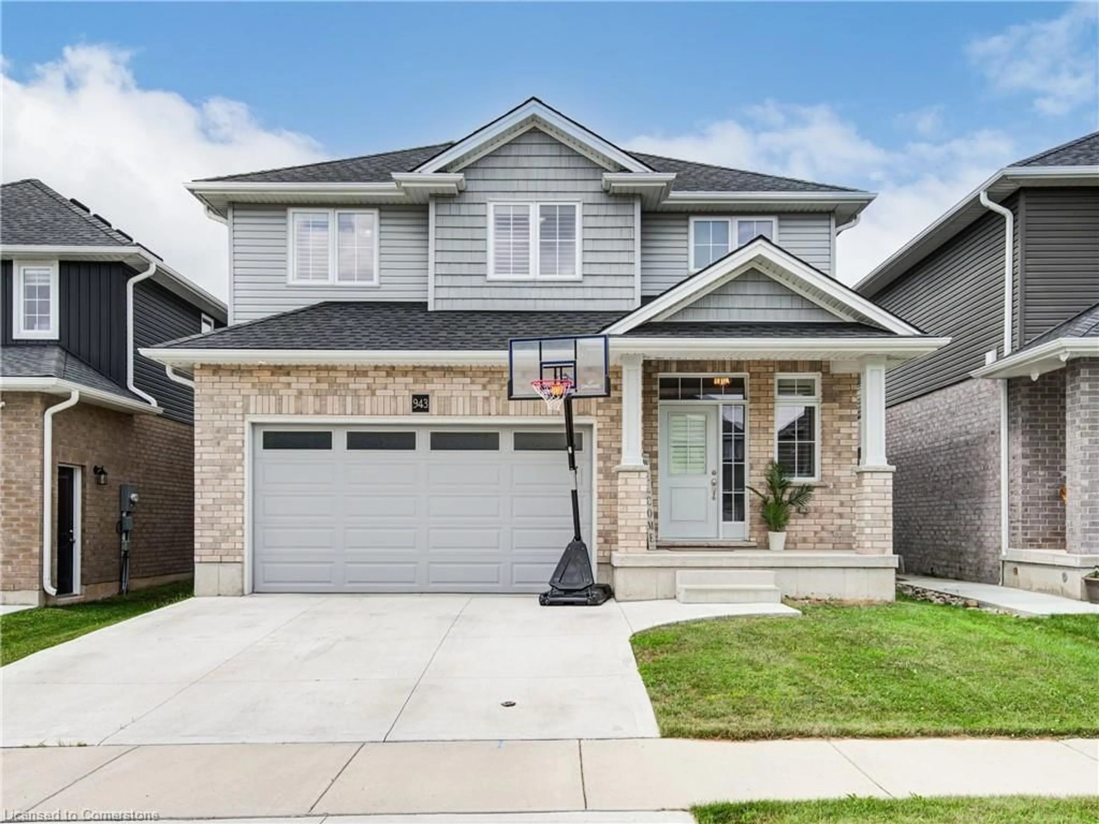 Home with brick exterior material, street for 943 Downing Dr, Woodstock Ontario N4T 0E1