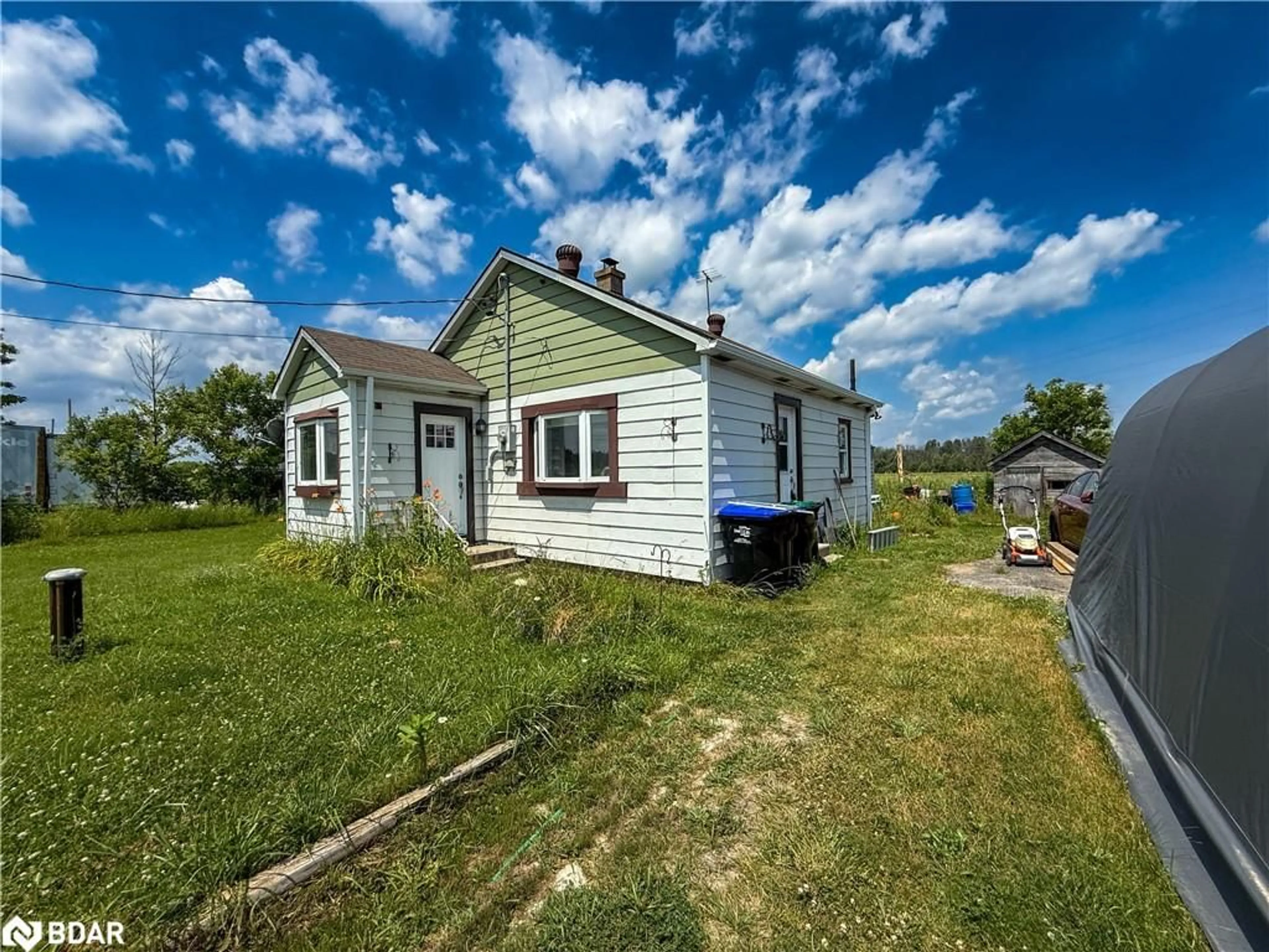 A pic from outside/outdoor area/front of a property/back of a property/a pic from drone, unknown for 6170 90 County Rd, Essa Ontario L0M 1B4