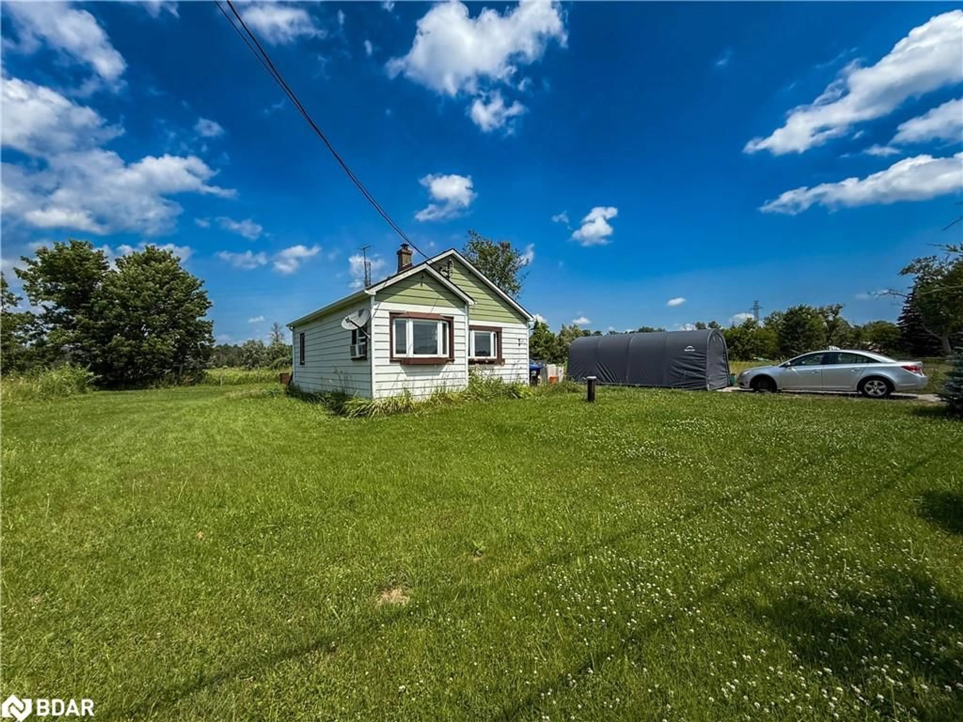 A pic from outside/outdoor area/front of a property/back of a property/a pic from drone, unknown for 6170 90 County Rd, Essa Ontario L0M 1B4