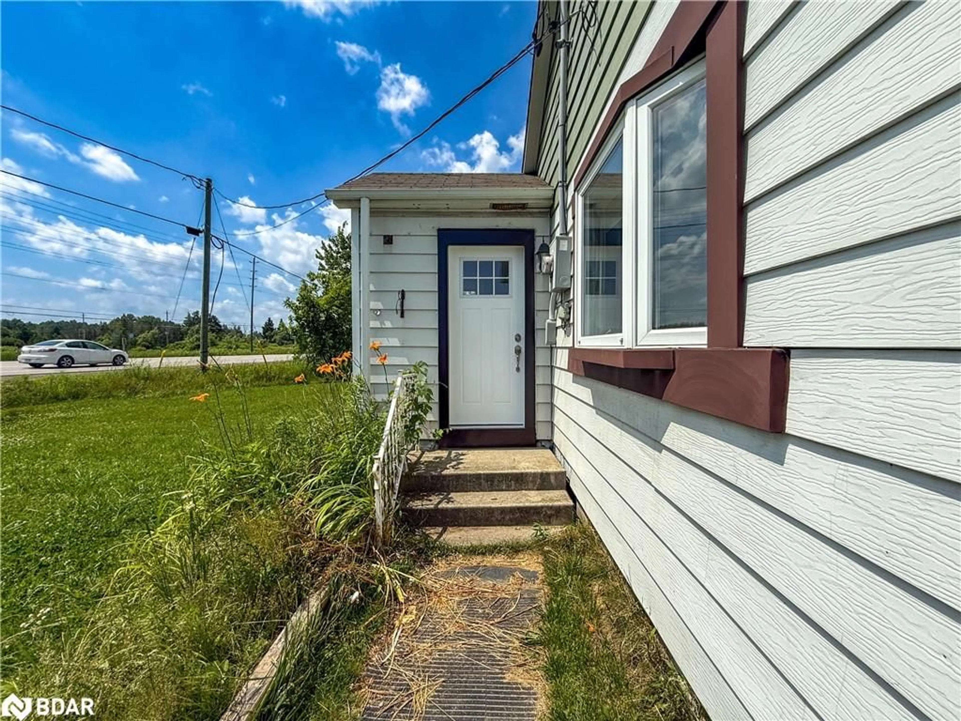 Home with vinyl exterior material, street for 6170 90 County Rd, Essa Ontario L0M 1B4