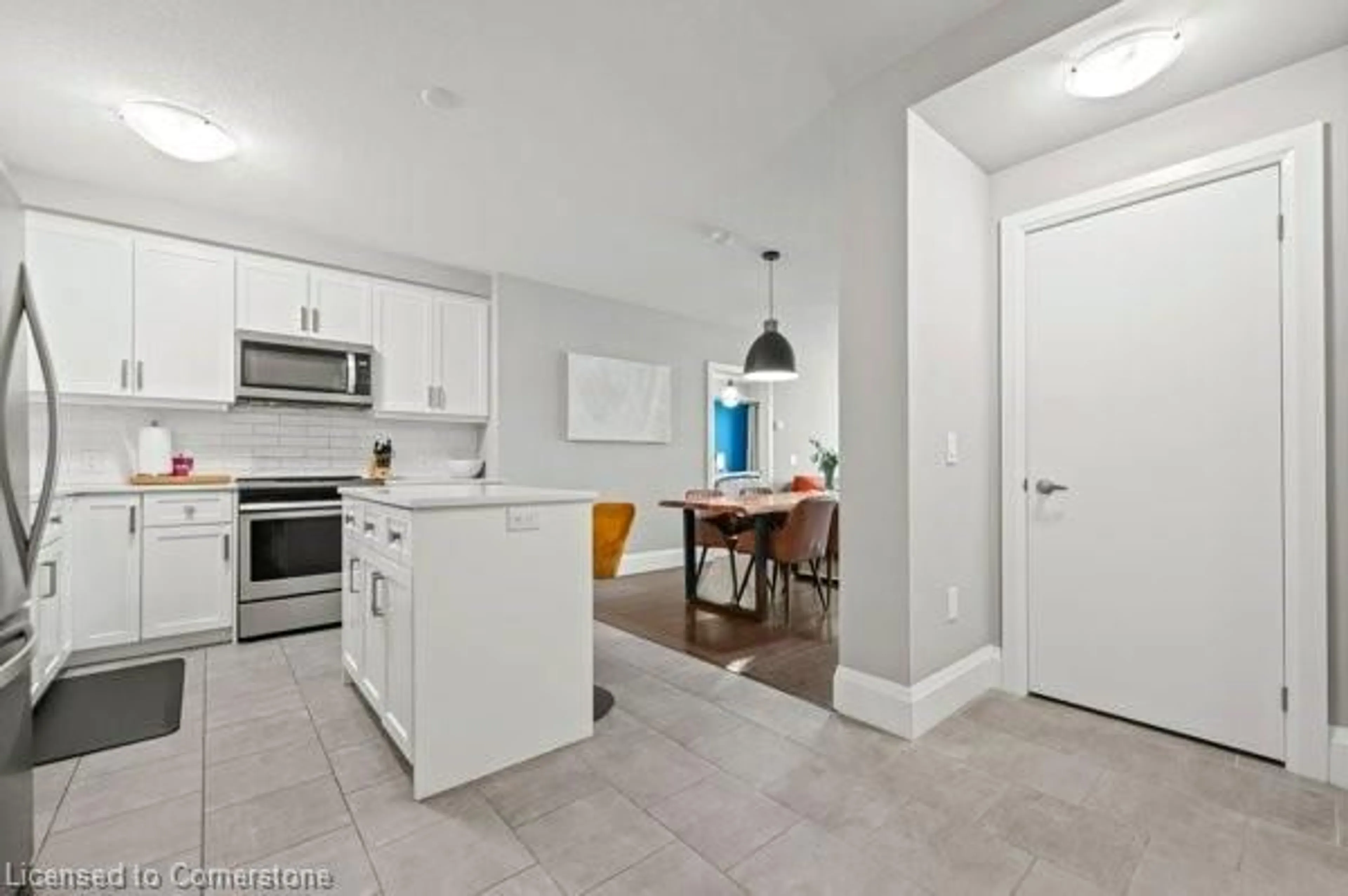 Open concept kitchen, ceramic/tile floor for 73 Arthur St #612, Guelph Ontario N1E 0S6