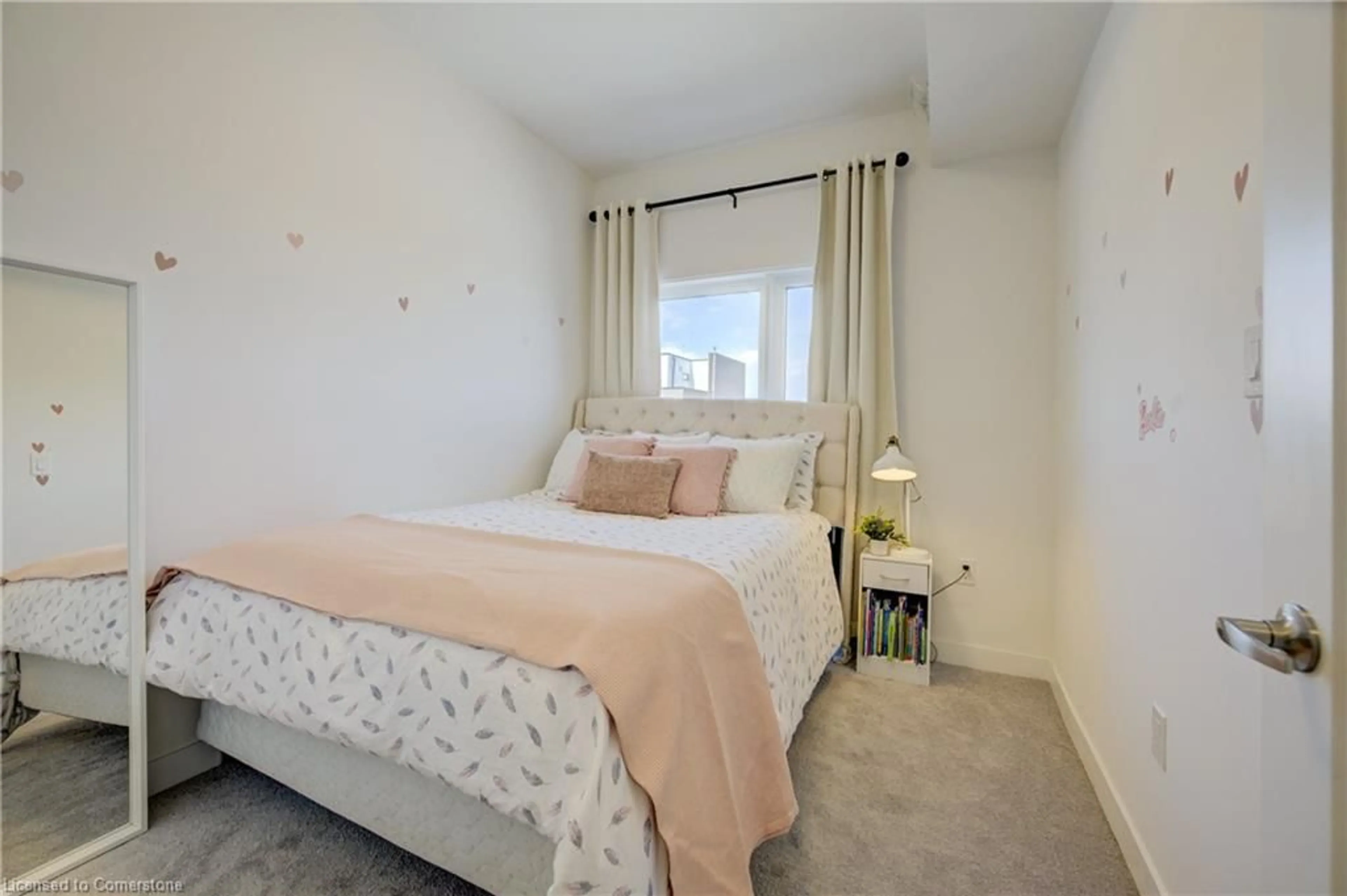 Bedroom with bed, carpet floor for 20 Palace St #F11, Kitchener Ontario N2E 0J3