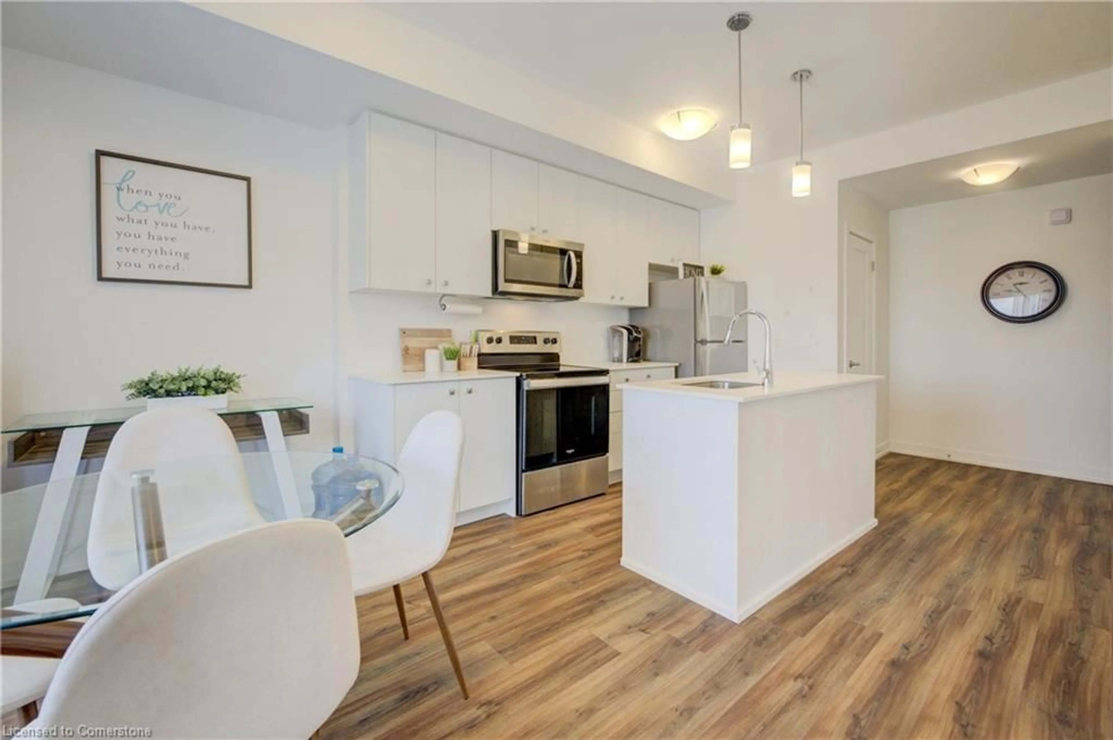 Open concept kitchen, wood/laminate floor for 20 Palace St #F11, Kitchener Ontario N2E 0J3