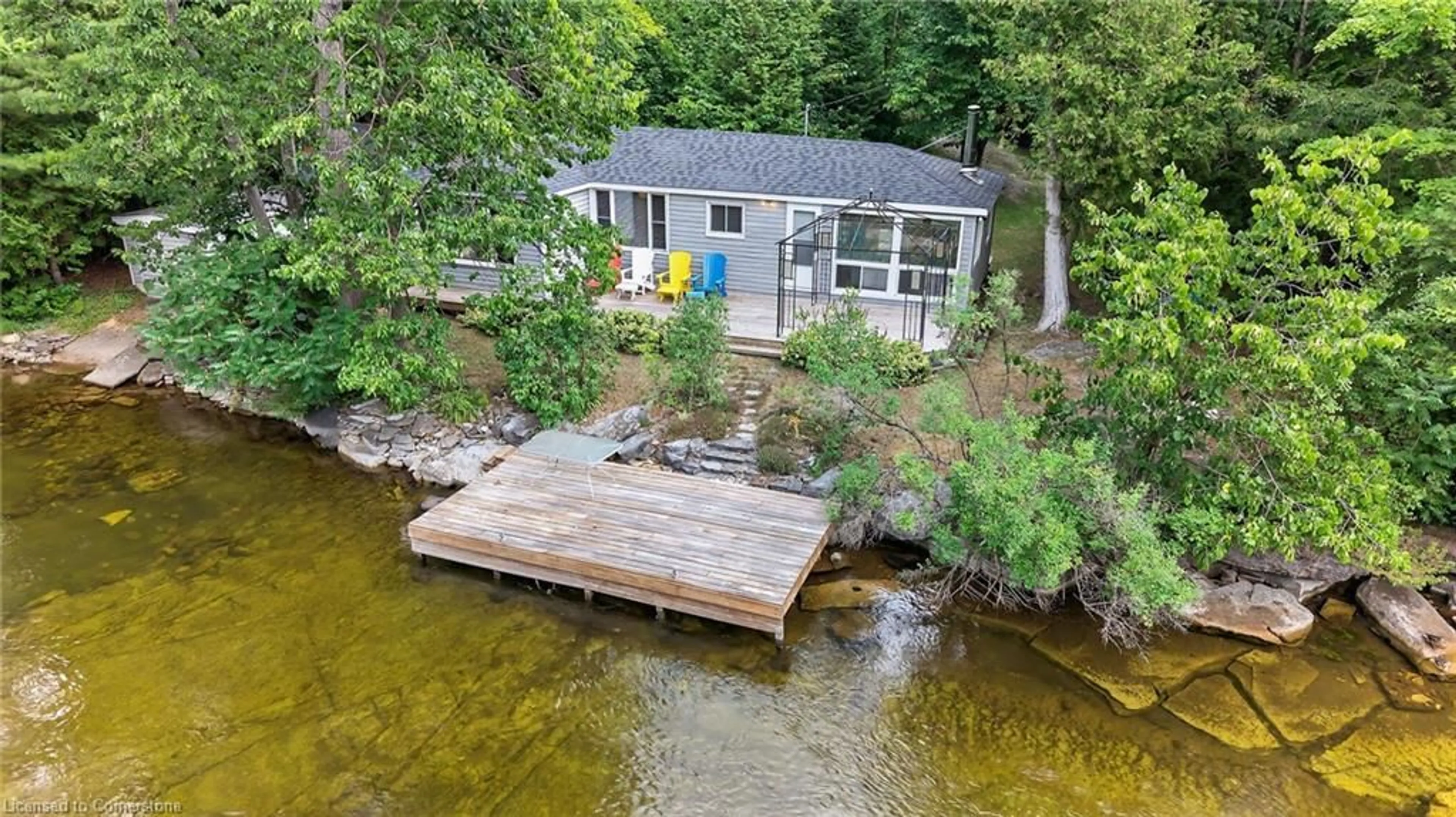 A pic from outside/outdoor area/front of a property/back of a property/a pic from drone, water/lake/river/ocean view for 92 Shadow Lake Rd 28 Rd, Coboconk Ontario K0M 1K0