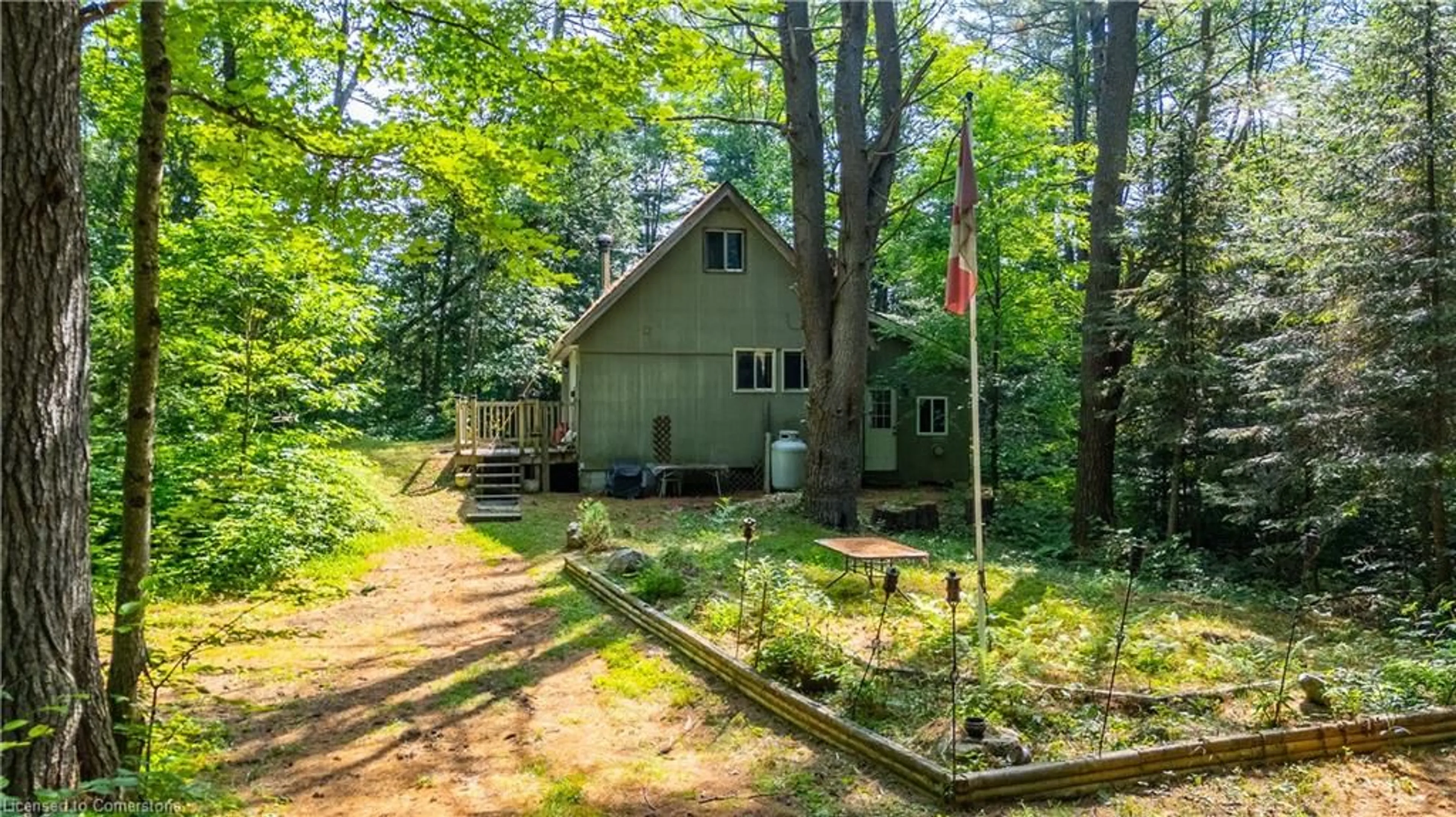 A pic from outside/outdoor area/front of a property/back of a property/a pic from drone, forest/trees view for 1083 Fairy Falls Rd, Baysville Ontario P0B 1A0