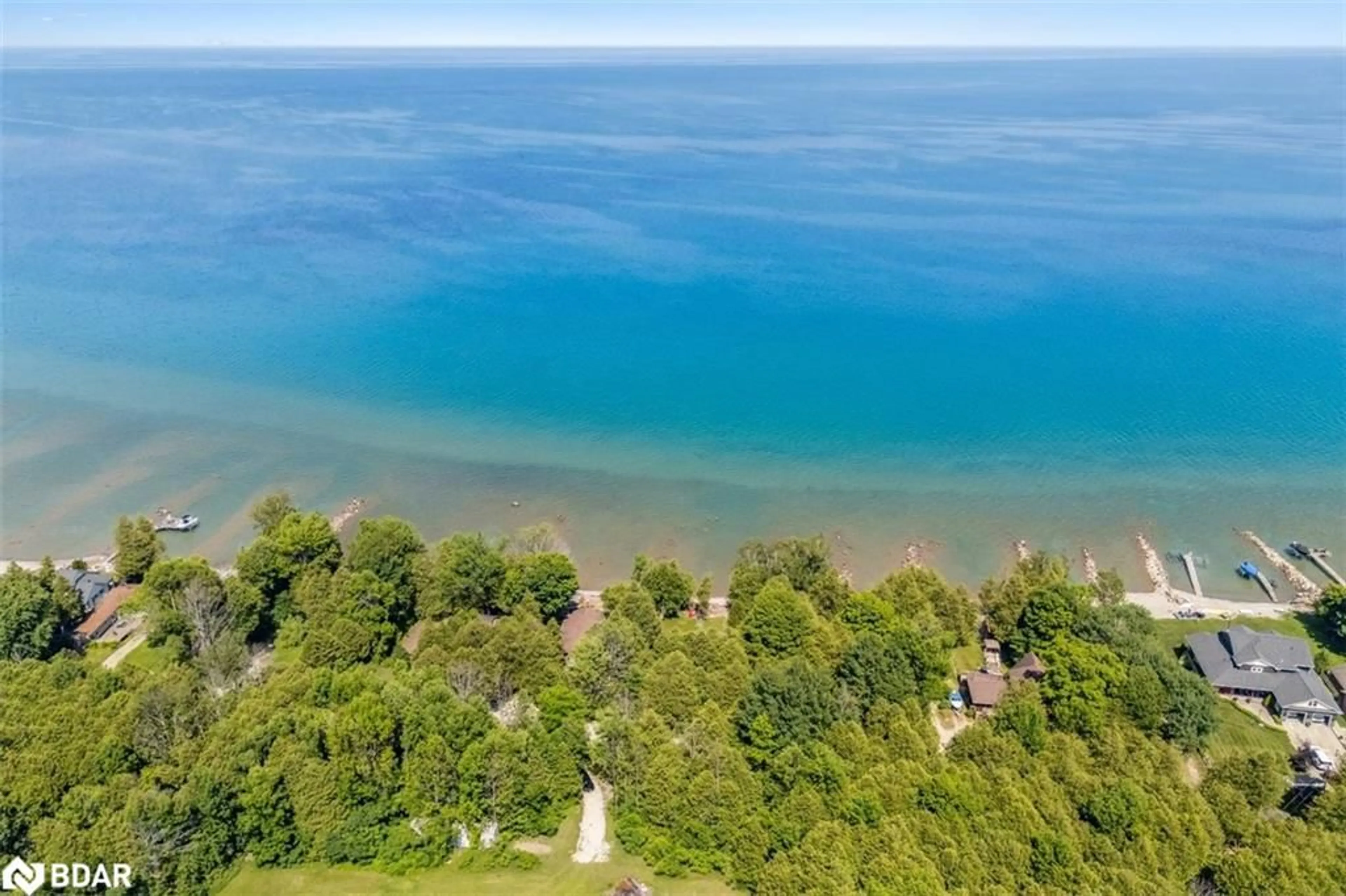 A pic from outside/outdoor area/front of a property/back of a property/a pic from drone, water/lake/river/ocean view for 205 Georgian Beach Rd, Meaford Ontario N4L 1W5