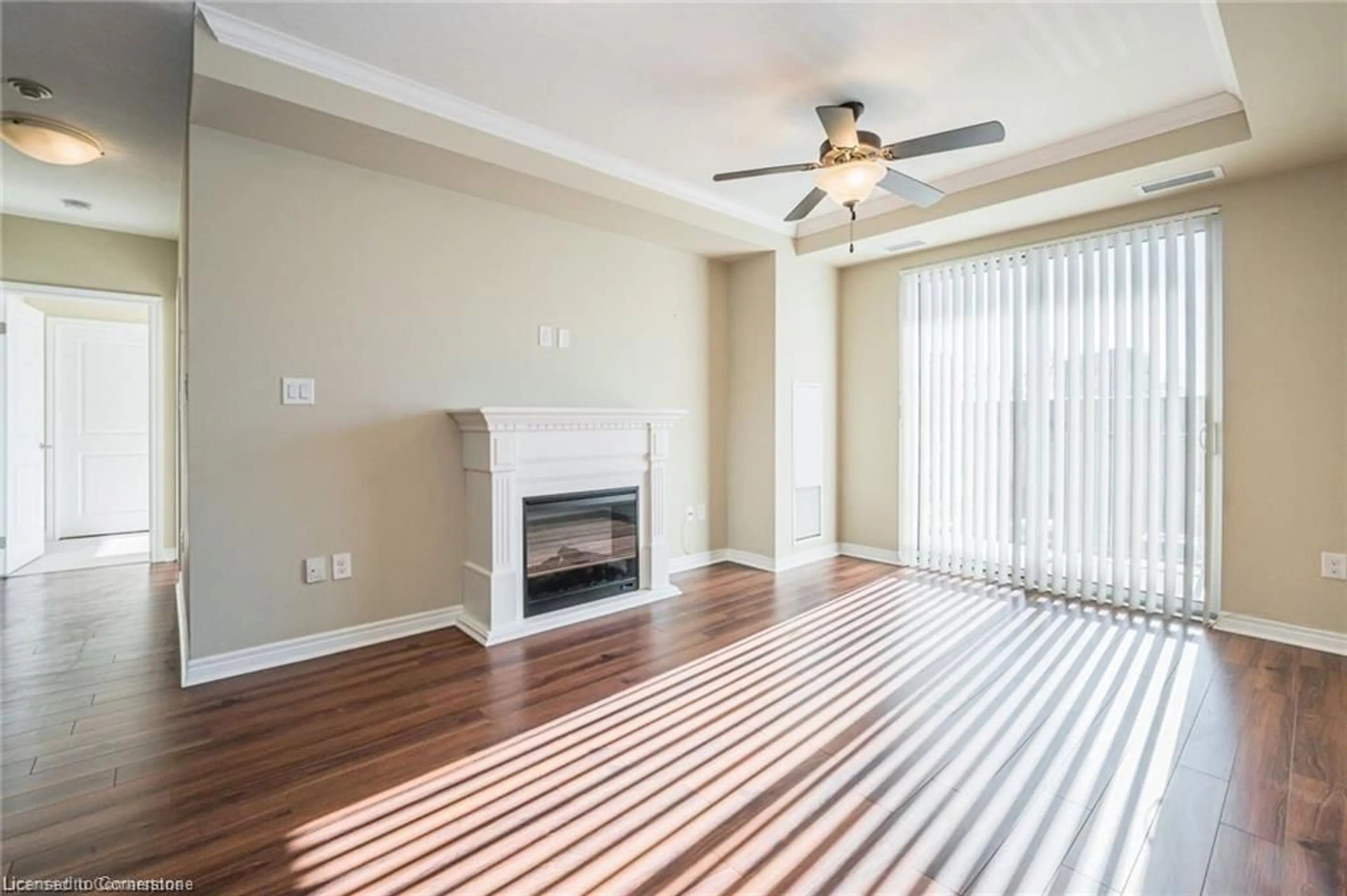 Living room with furniture, wood/laminate floor for 539 Belmont Ave #210, Kitchener Ontario N2M 0A2