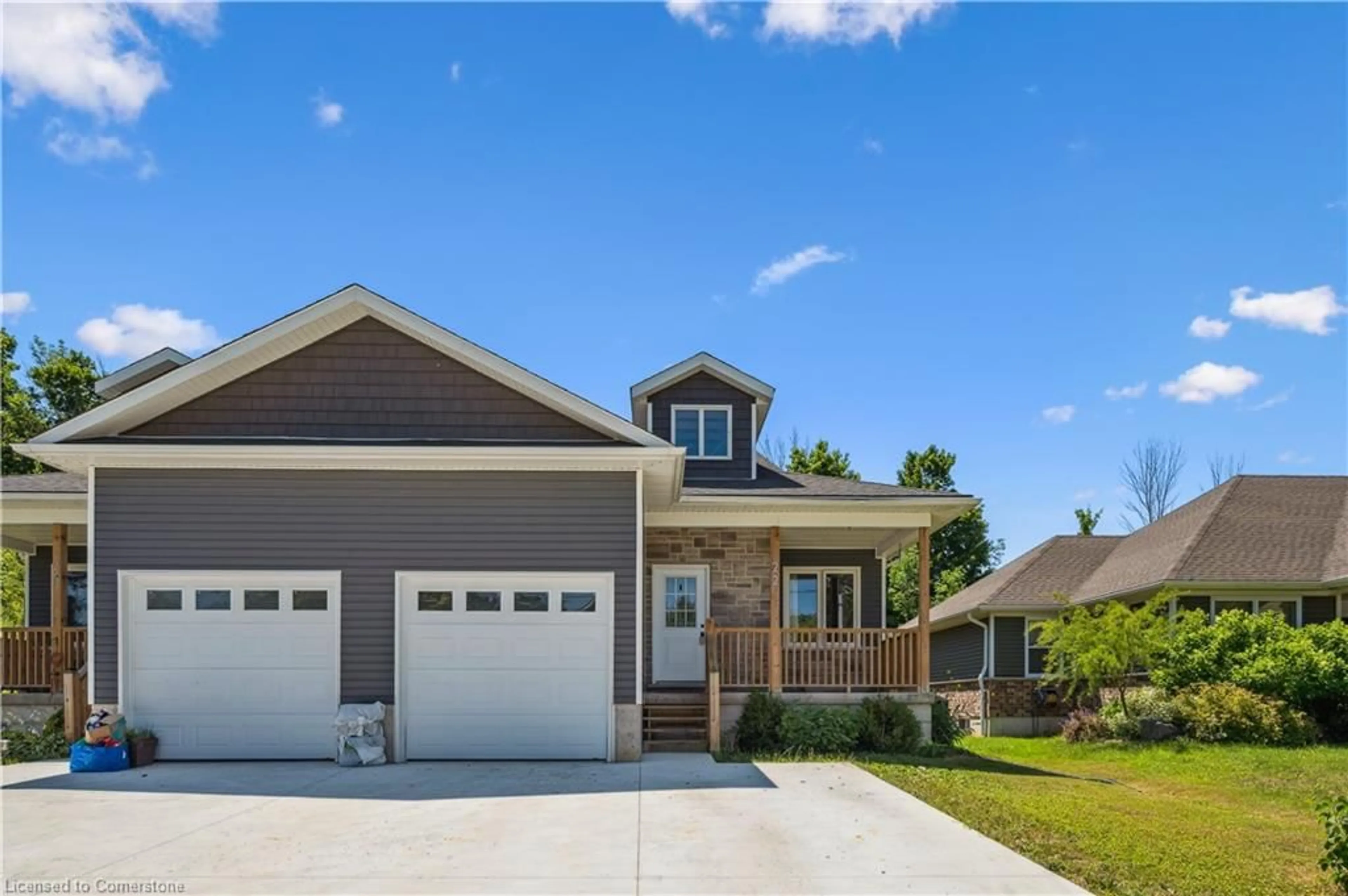 Home with vinyl exterior material, street for 22 Ann St, Clifford Ontario N0G 1M0