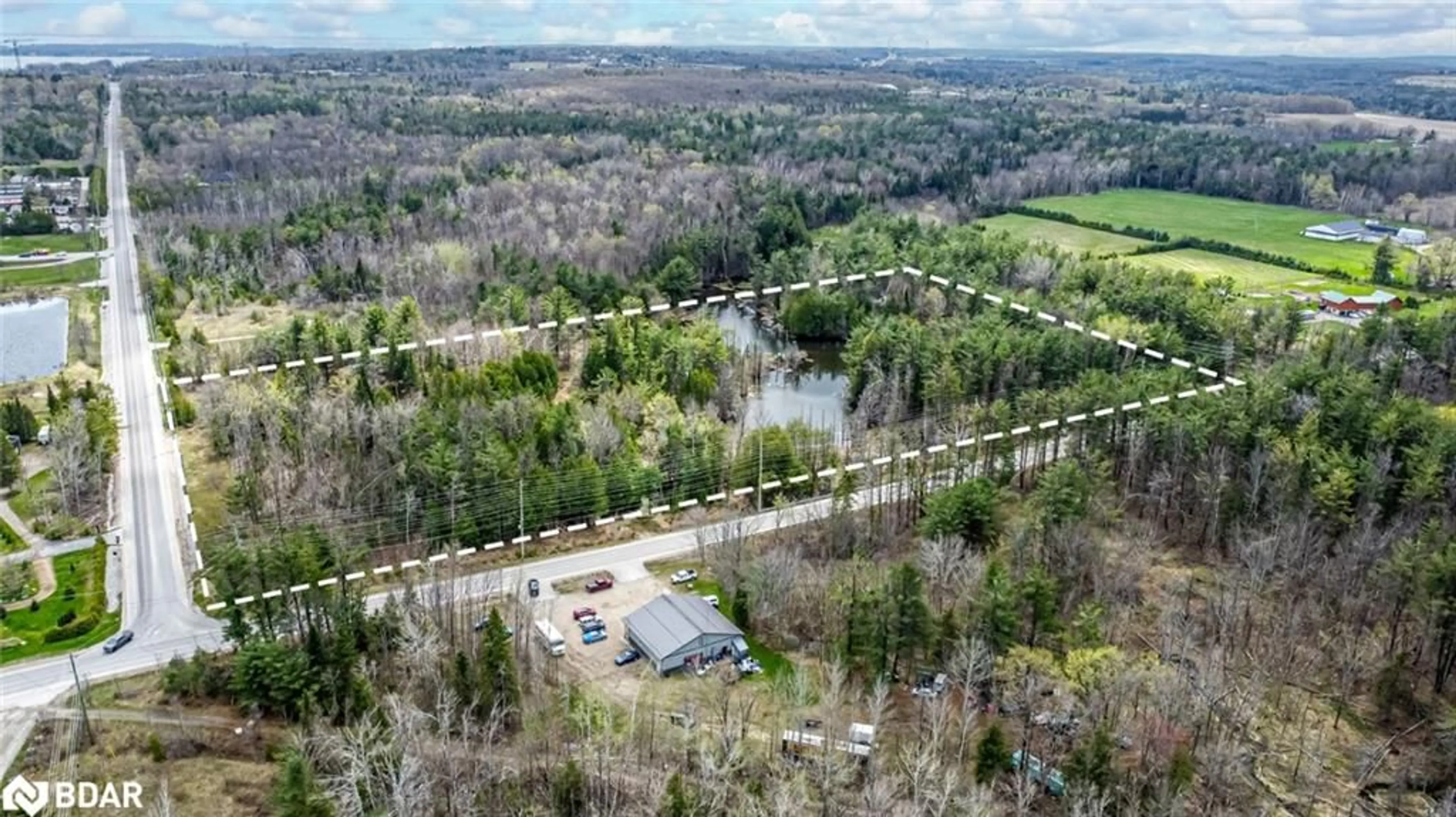 A pic from outside/outdoor area/front of a property/back of a property/a pic from drone, water/lake/river/ocean view for 4016 Carlyon Line, Severn Ontario L3V 0W8