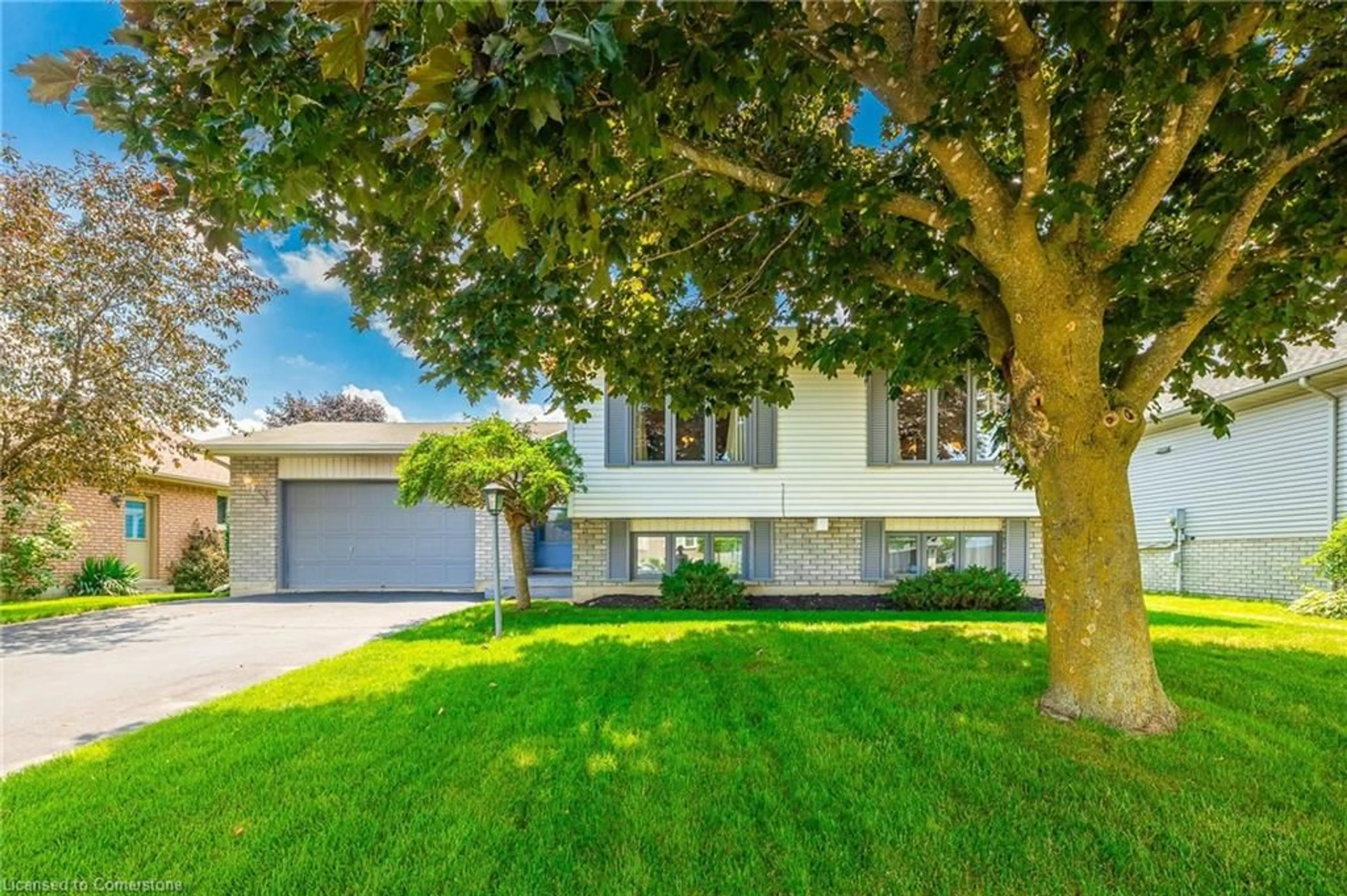 Home with vinyl exterior material, street for 36 Windsor Dr, St. George Ontario N0E 1N0