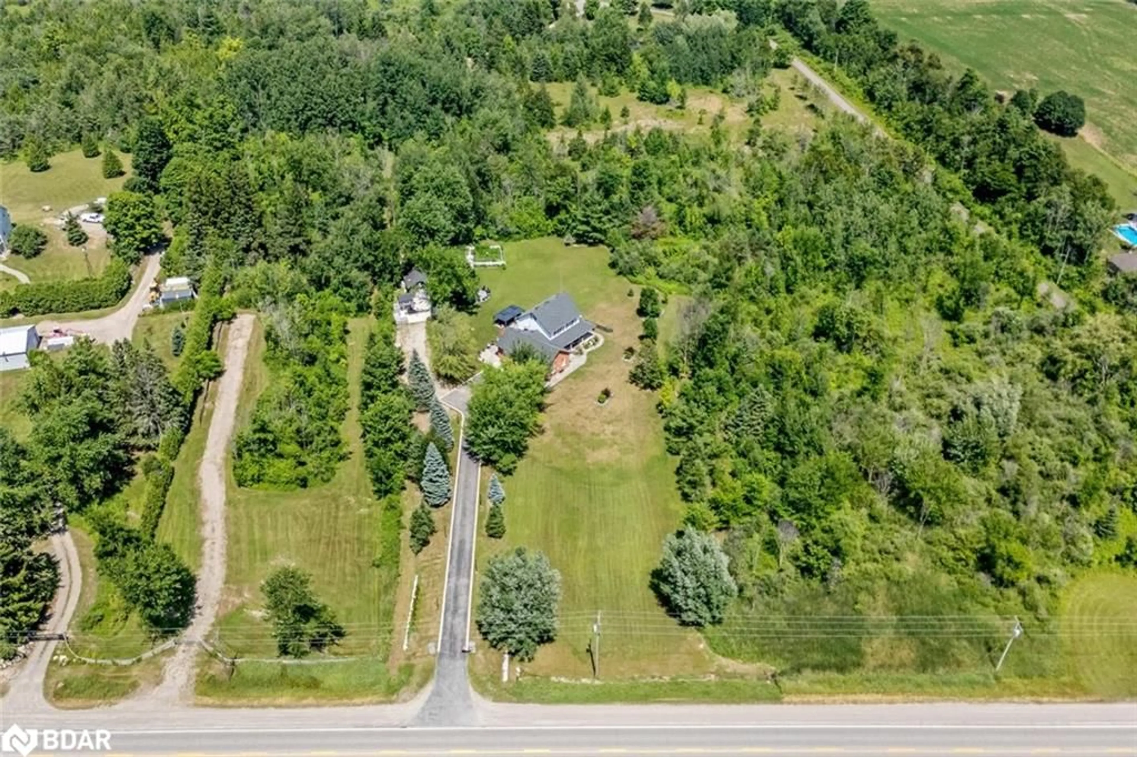 A pic from outside/outdoor area/front of a property/back of a property/a pic from drone, unknown for 5029 Trafalgar Rd, Wellington Ontario L7G 4S4