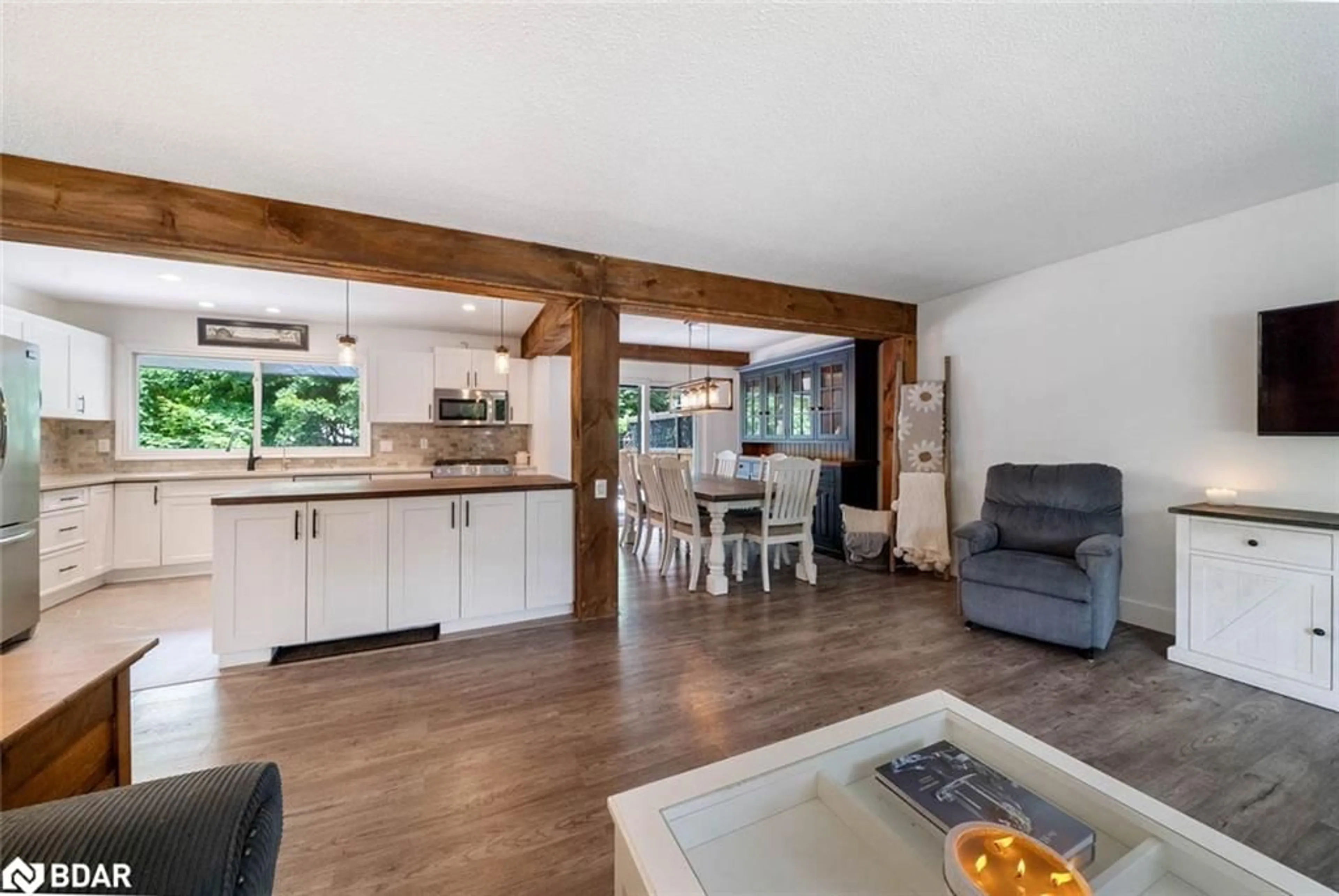 Open concept kitchen, wood/laminate floor for 2 Noraline Ave, Midhurst Ontario L0L 1X1