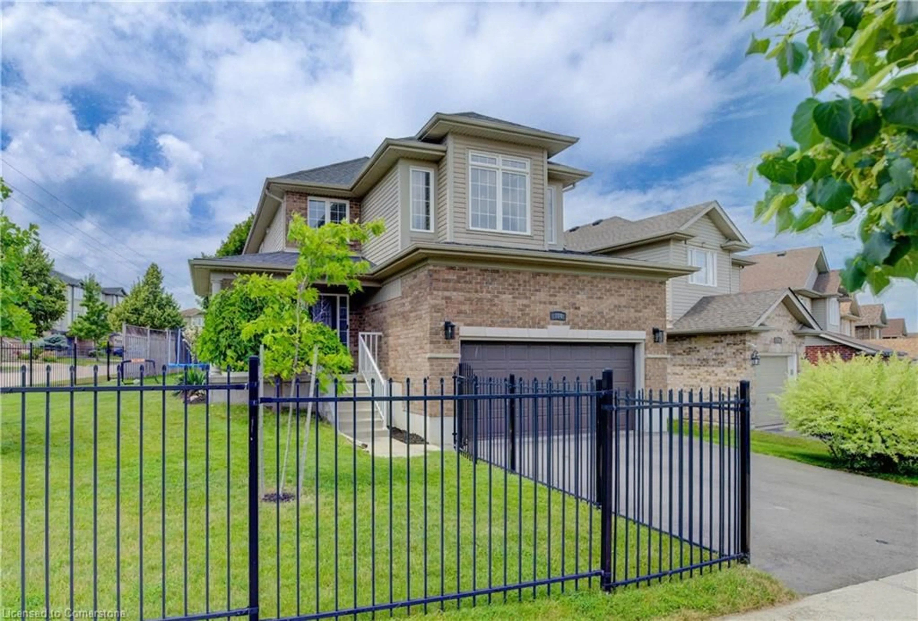Home with brick exterior material, street for 104 Newcastle Dr, Kitchener Ontario N2R 1W4