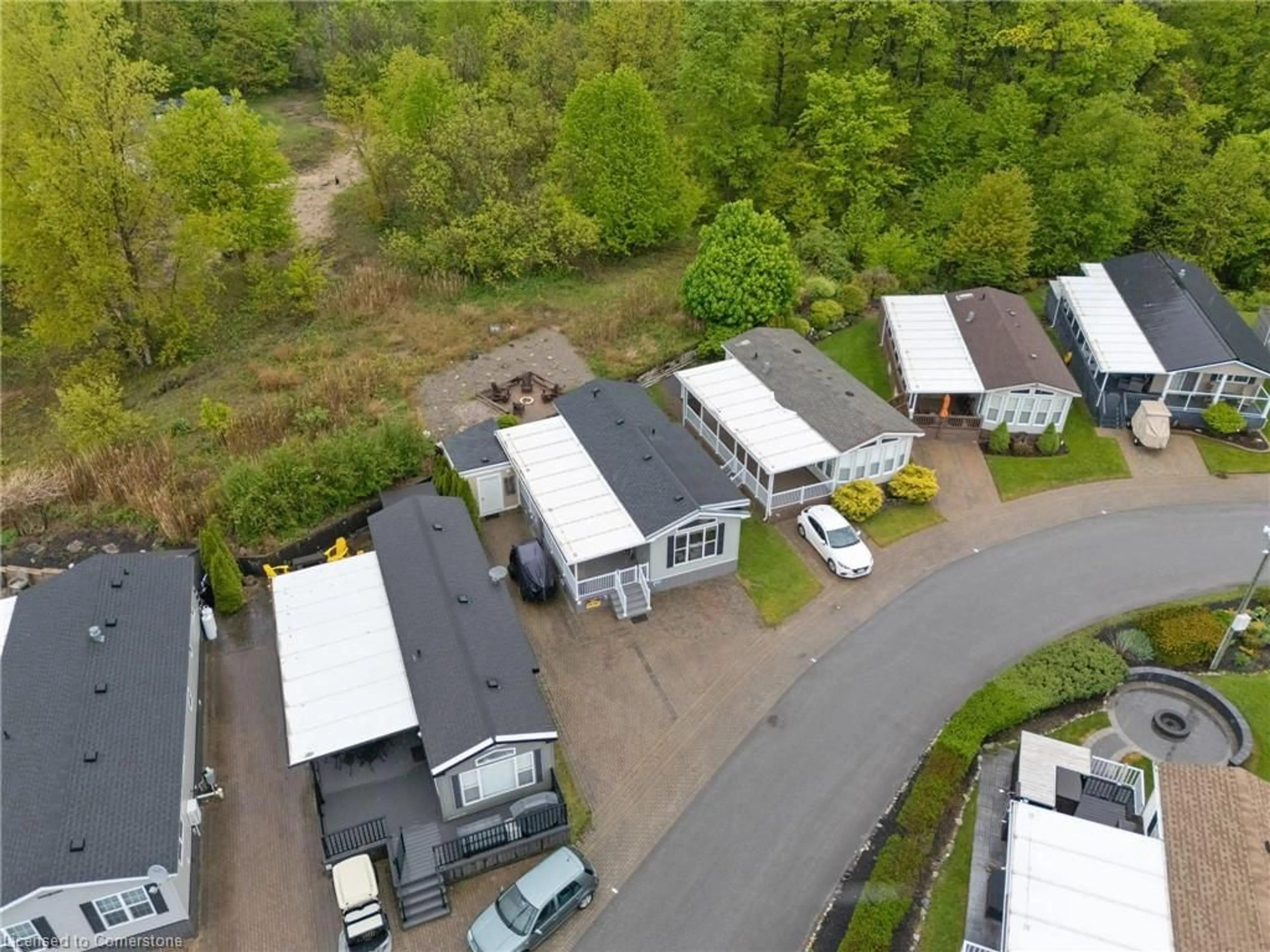 A pic from outside/outdoor area/front of a property/back of a property/a pic from drone, street for 490 Empire Rd #213, Sherkston Ontario L0S 1R0