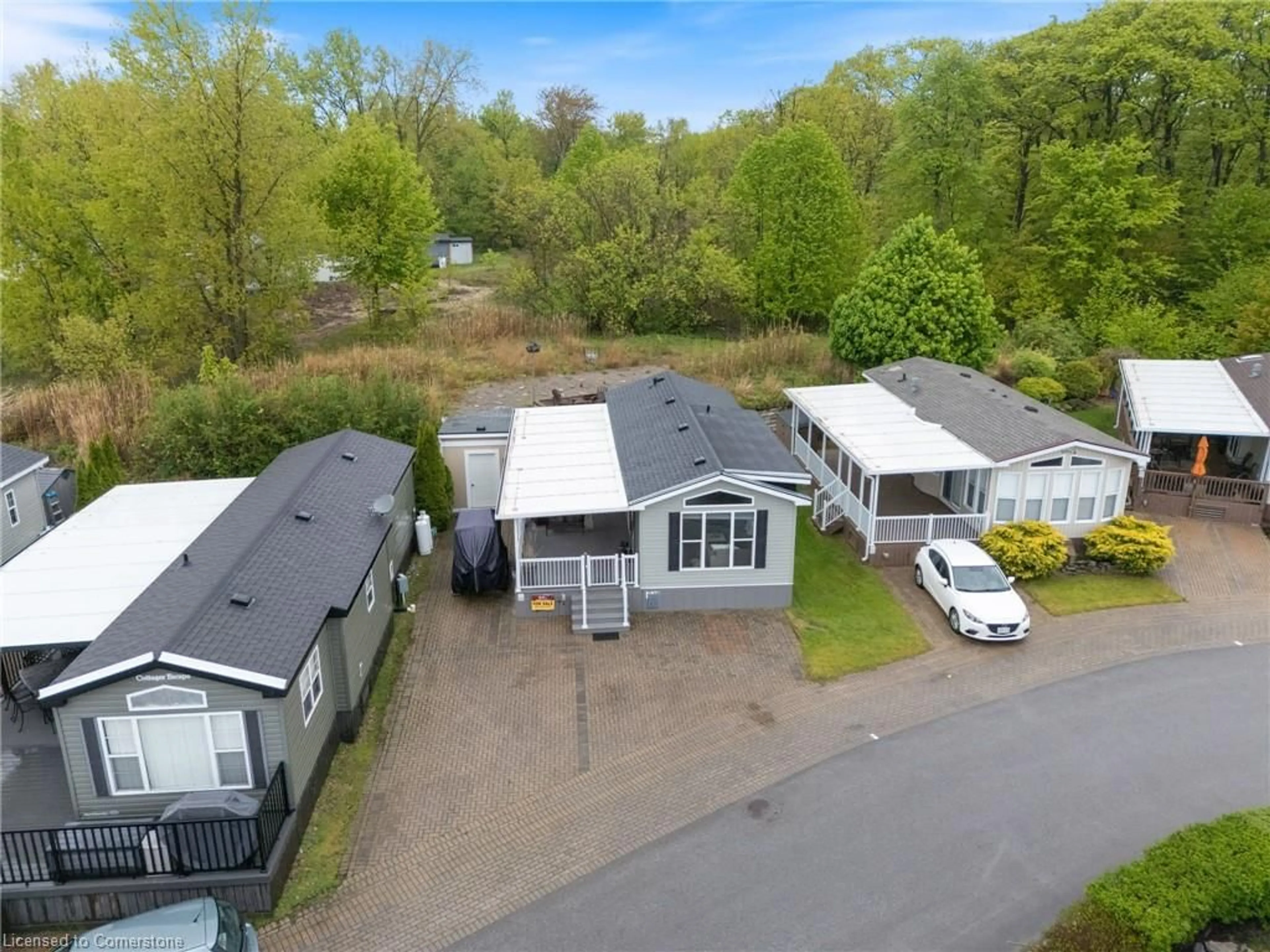 A pic from outside/outdoor area/front of a property/back of a property/a pic from drone, street for 490 Empire Rd #213, Sherkston Ontario L0S 1R0