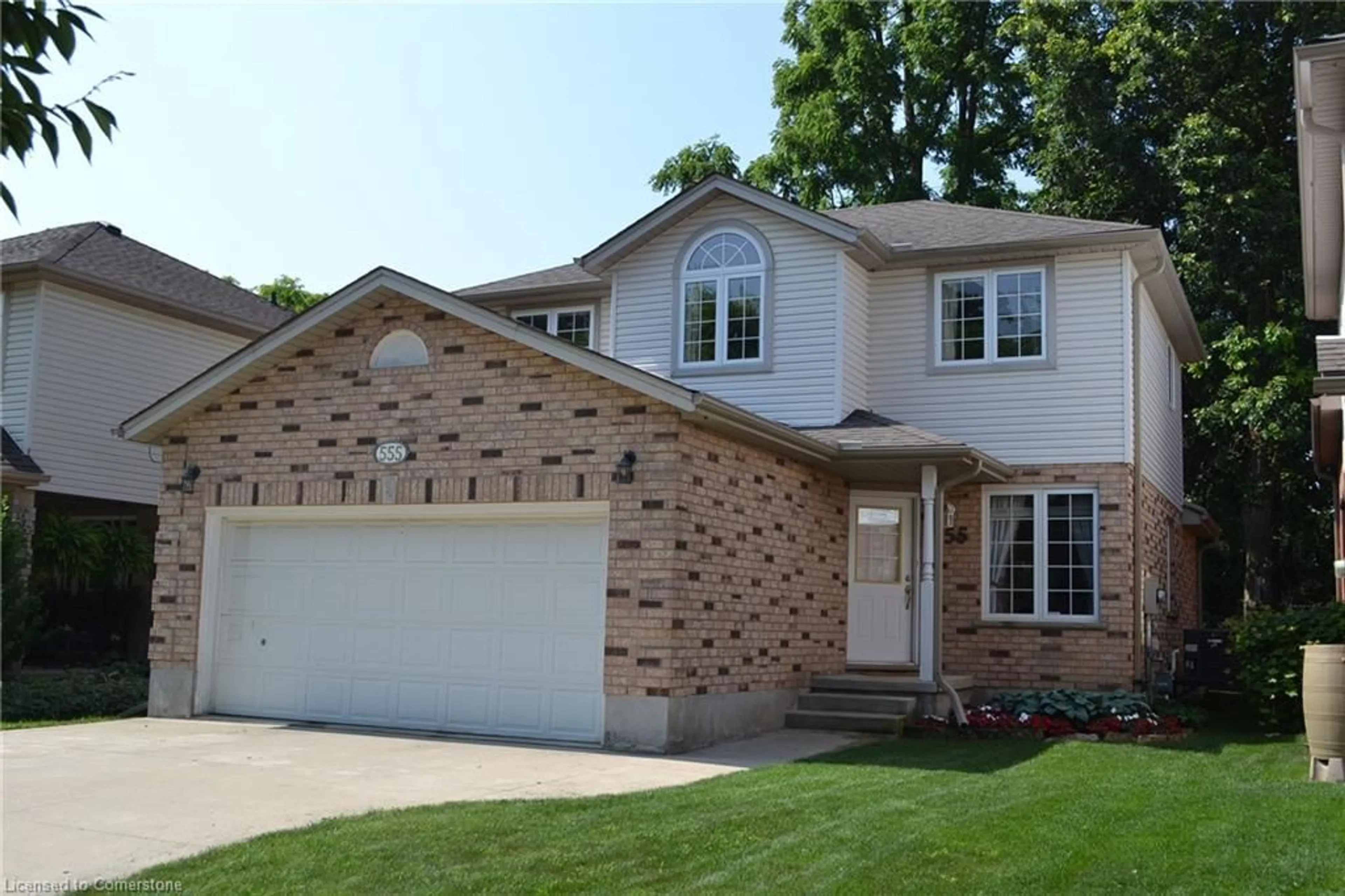 Home with brick exterior material, street for 555 Brigantine Dr, Waterloo Ontario N2K 4A7