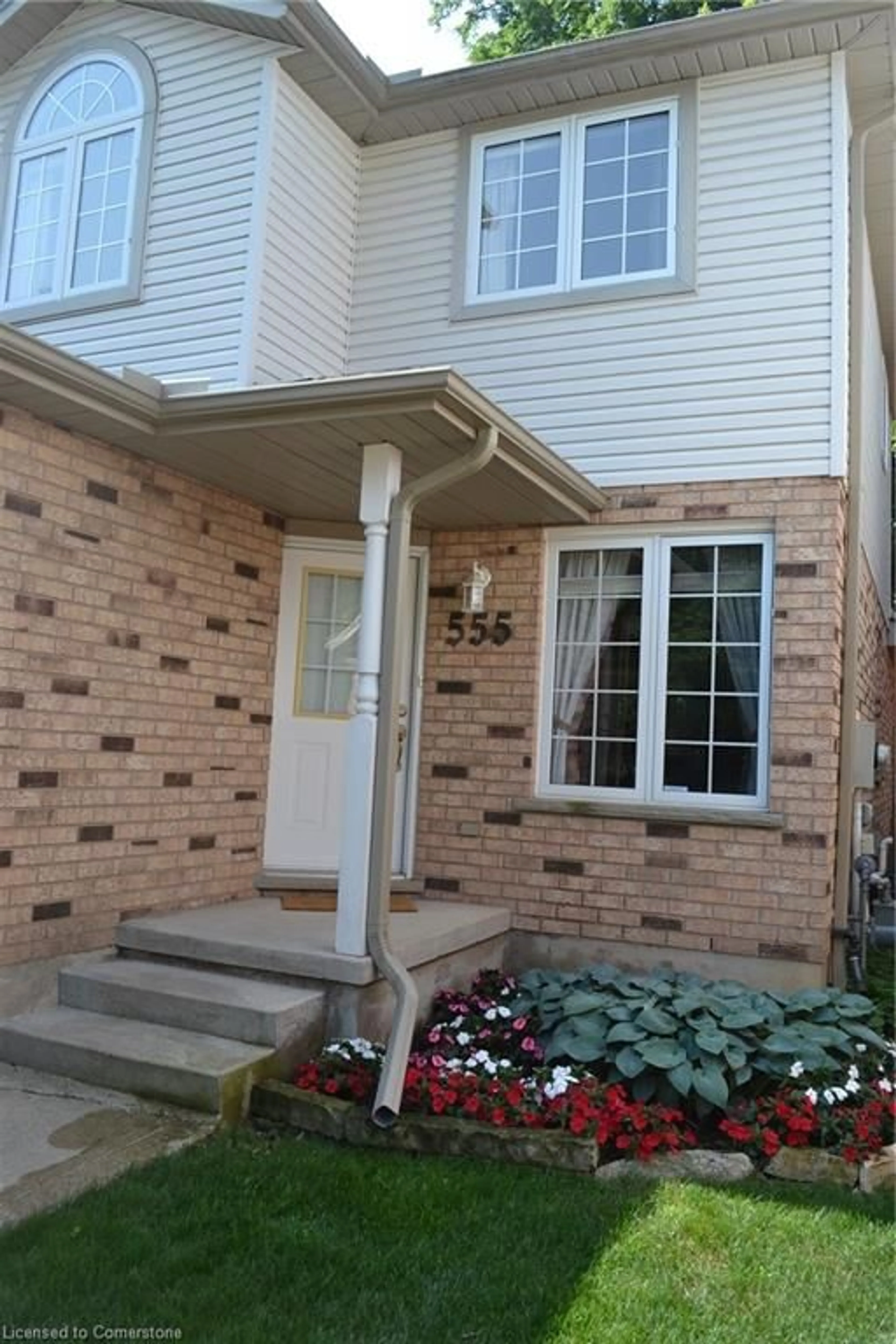 Home with brick exterior material, street for 555 Brigantine Dr, Waterloo Ontario N2K 4A7