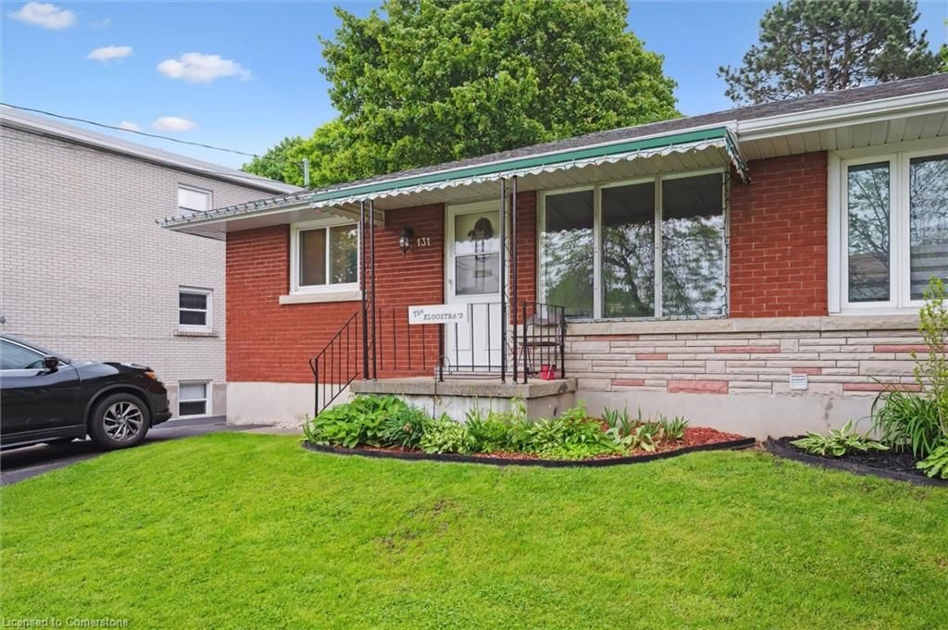 Home with brick exterior material, street for 131 Waverley Dr, Guelph Ontario N1E 1H1
