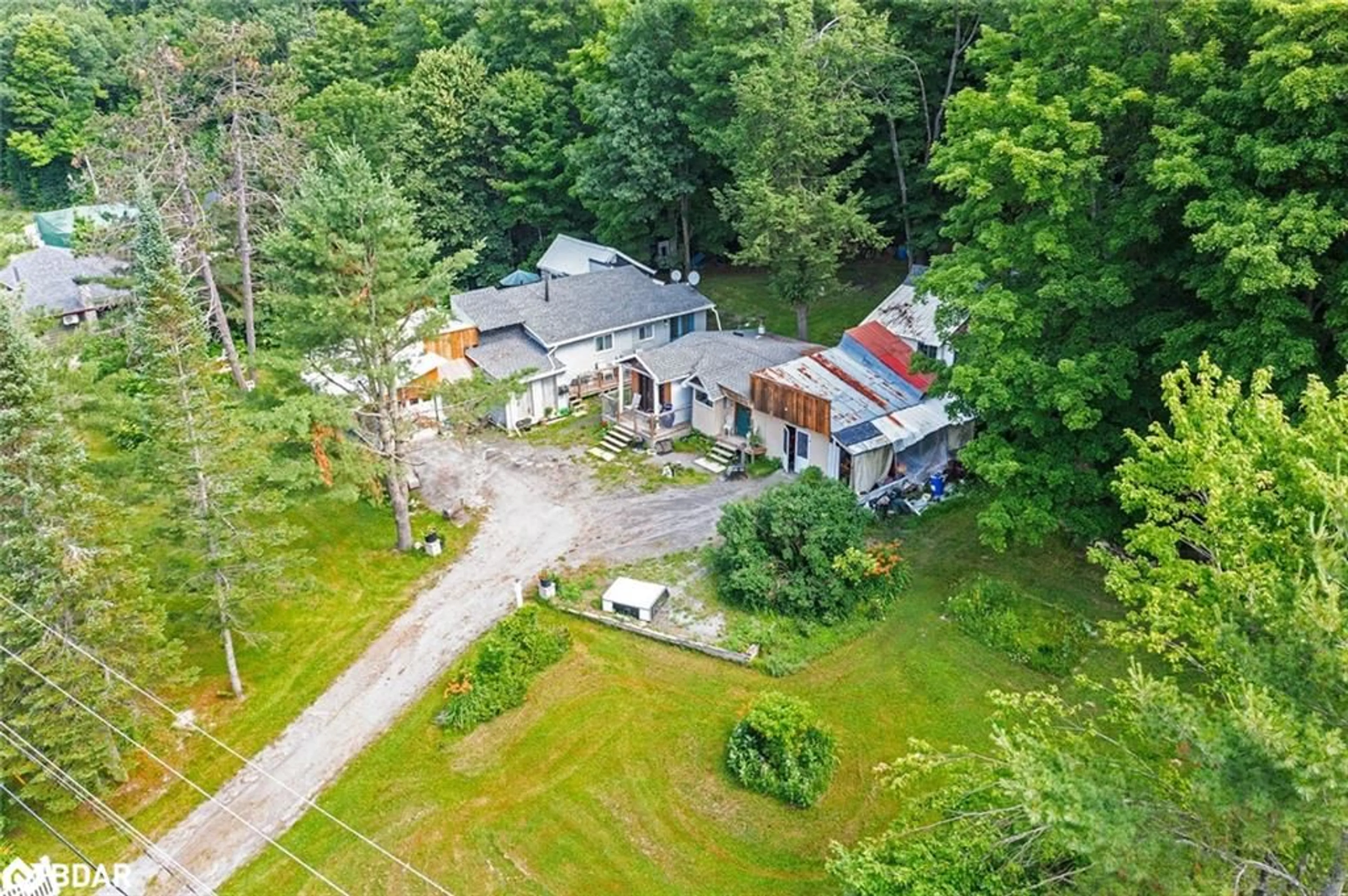 A pic from outside/outdoor area/front of a property/back of a property/a pic from drone, unknown for 1291 Muskoka Rd 118 W, Bracebridge Ontario P1L 1W8
