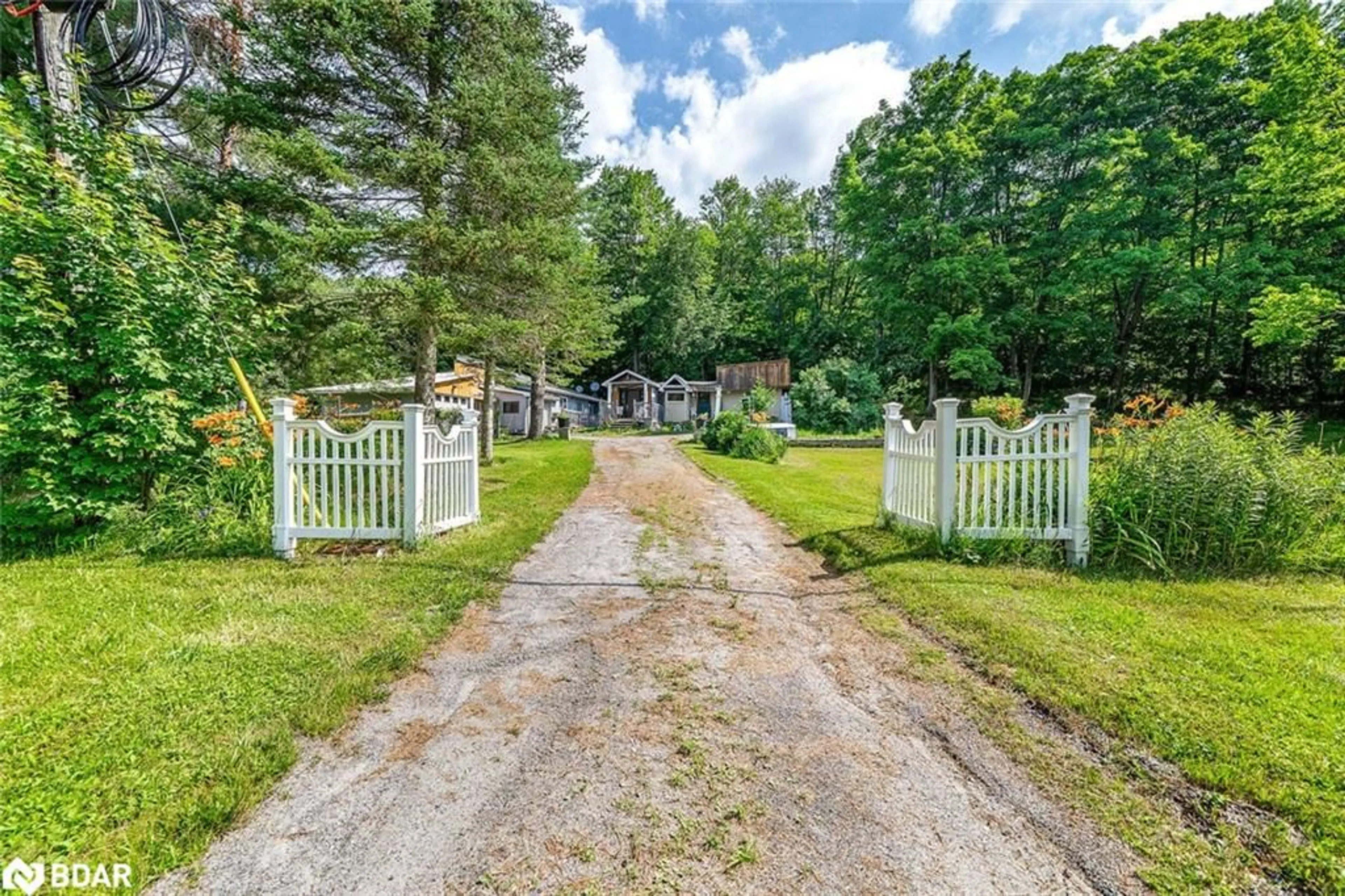 A pic from outside/outdoor area/front of a property/back of a property/a pic from drone, street for 1291 Muskoka Rd 118 W, Bracebridge Ontario P1L 1W8