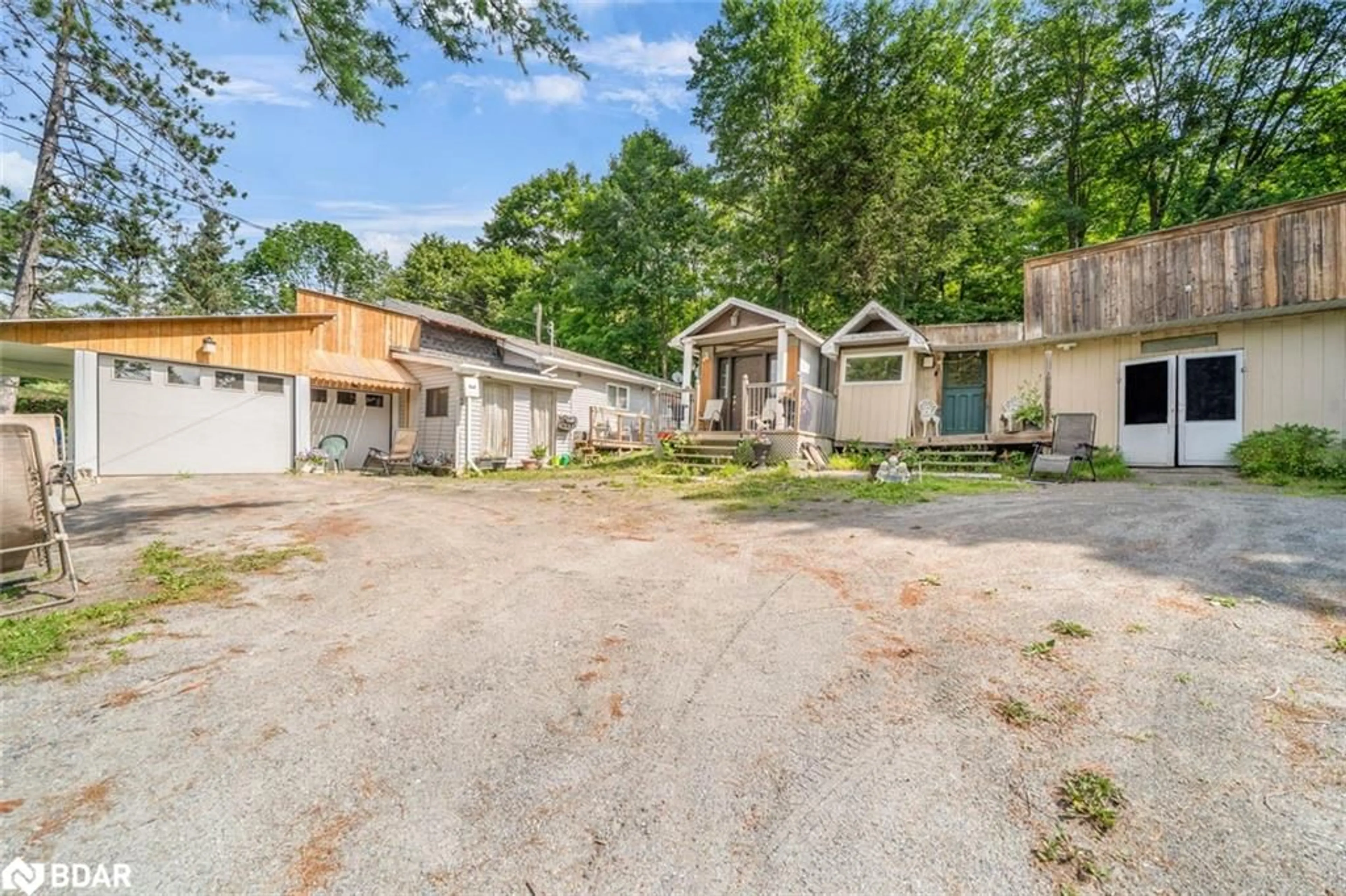 A pic from outside/outdoor area/front of a property/back of a property/a pic from drone, street for 1291 Muskoka Rd 118 W, Bracebridge Ontario P1L 1W8