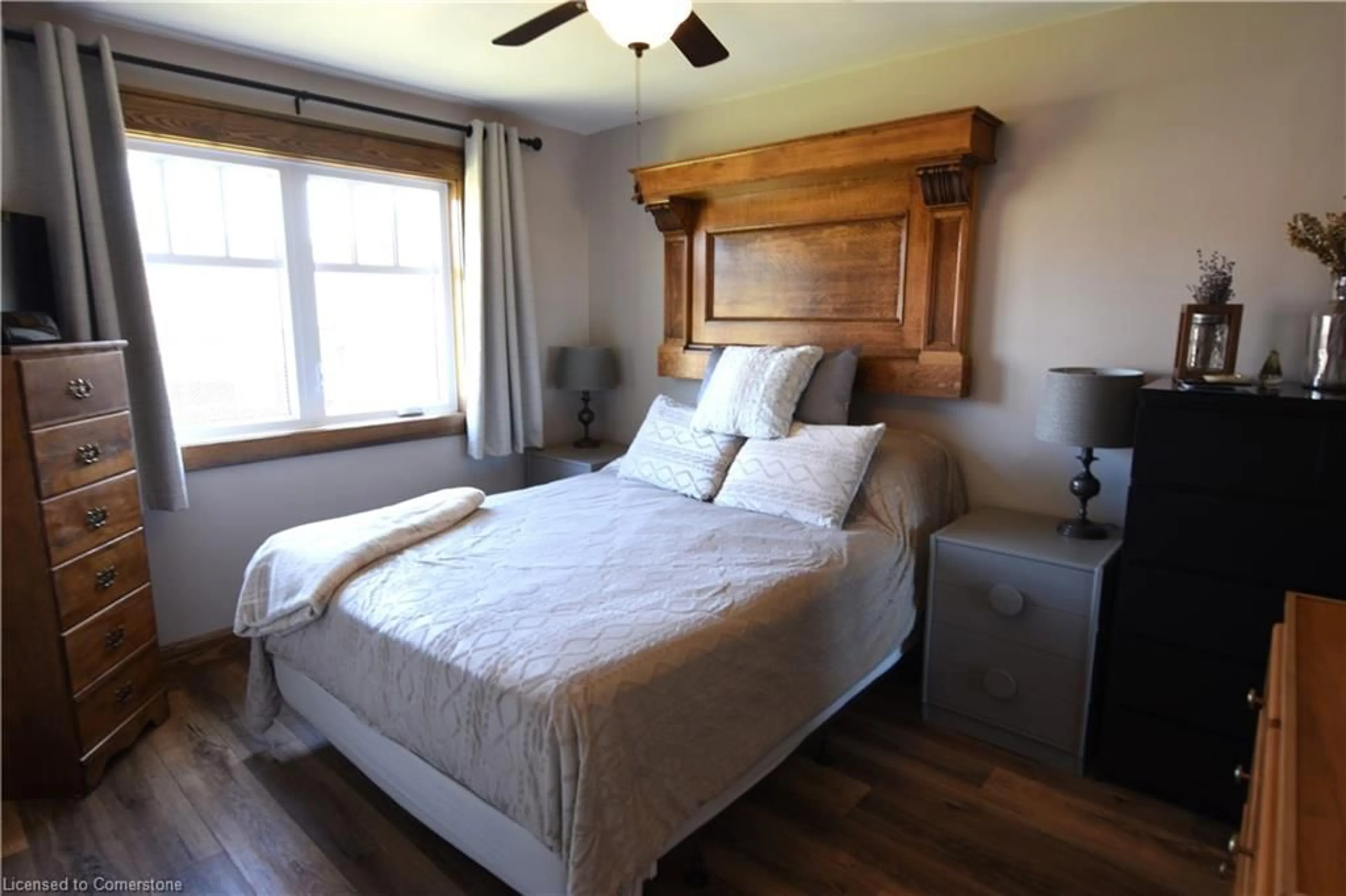 Bedroom with bed, wood/laminate floor for 22 Charlton Cres, Simcoe Ontario N3Y 1A7