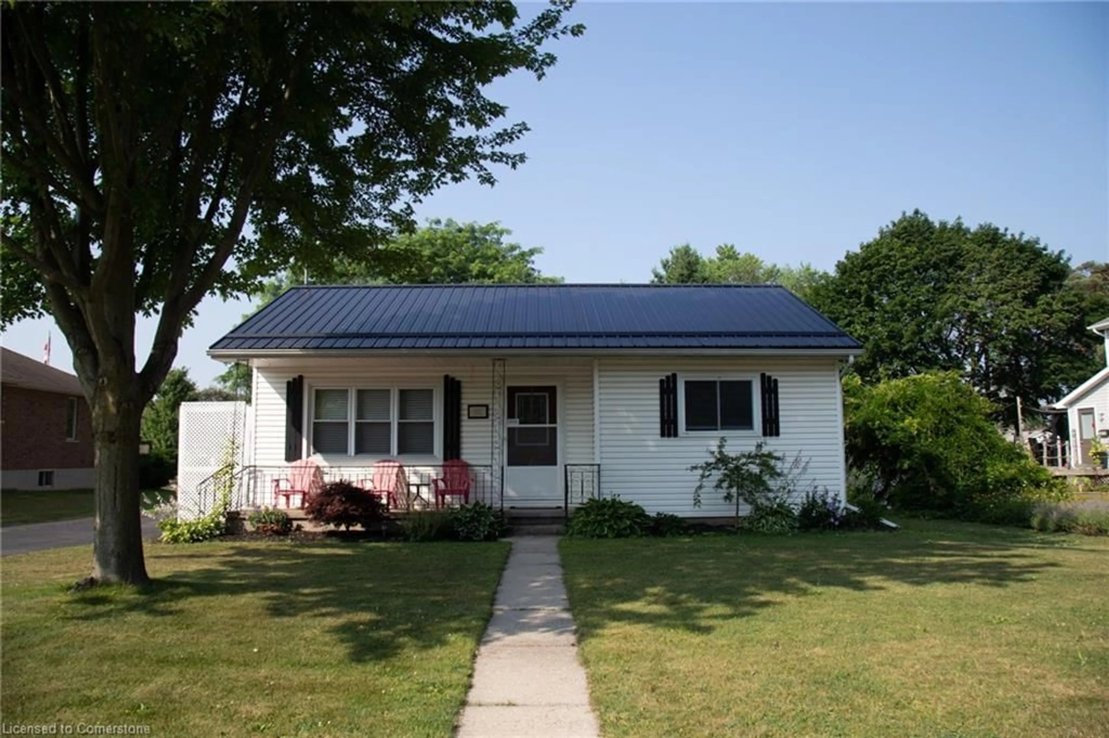 Home with vinyl exterior material, street for 831 Main St, Port Dover Ontario N0A 1N0