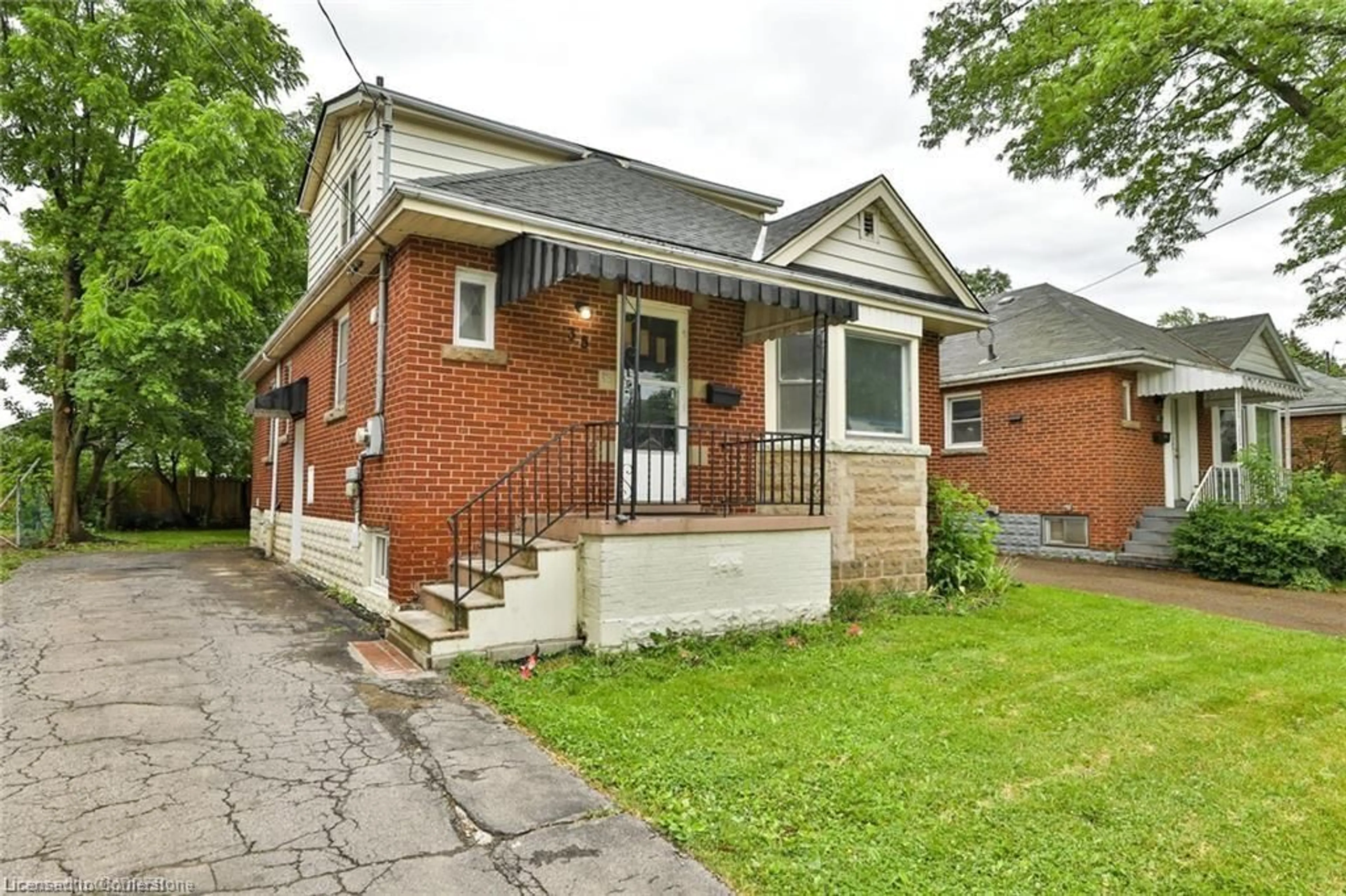 Home with brick exterior material, street for 35 West 3rd St, Hamilton Ontario L9C 3J8