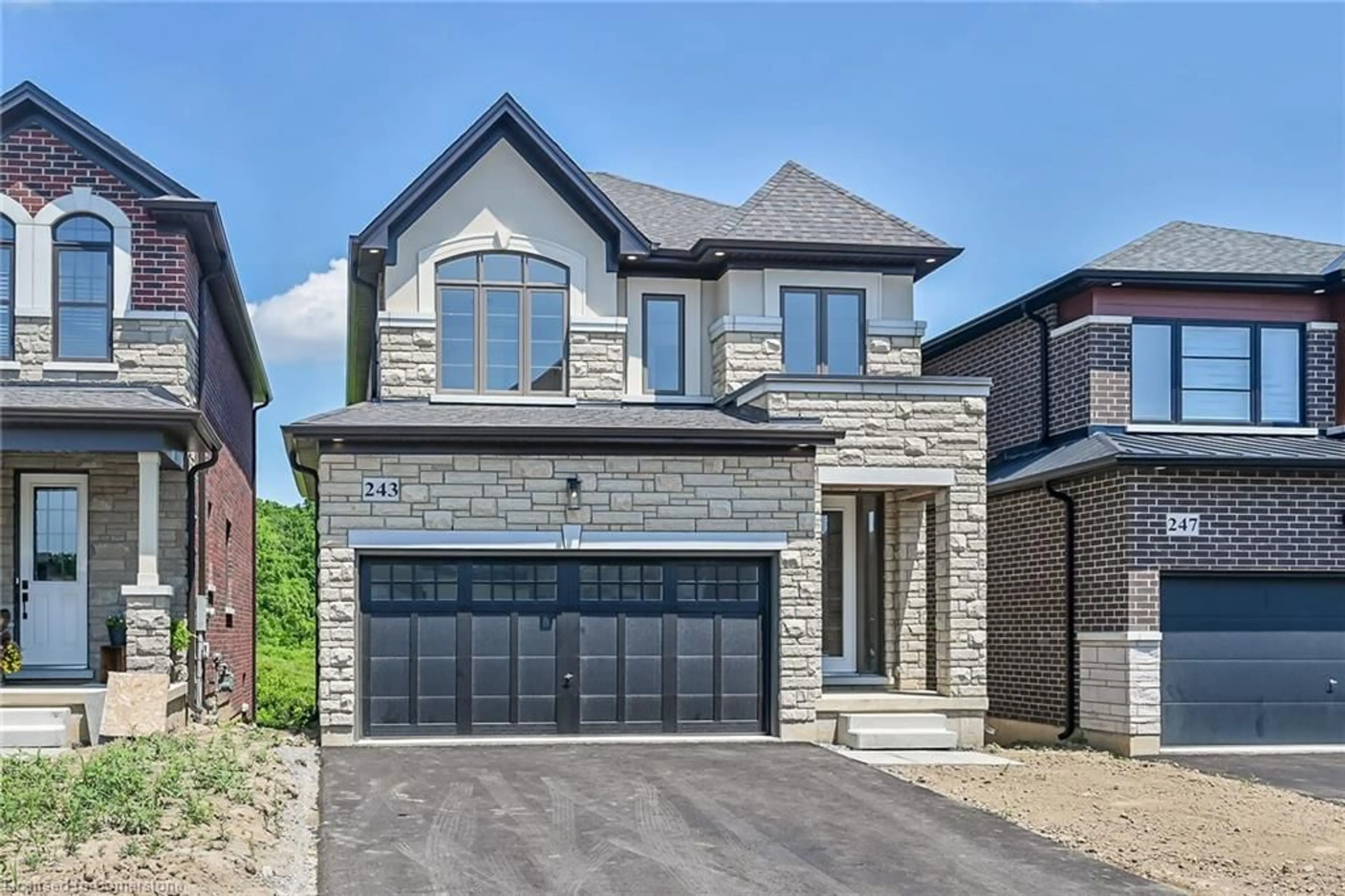 Home with brick exterior material, street for 243 Alessio Dr, Hamilton Ontario L9B 0K7