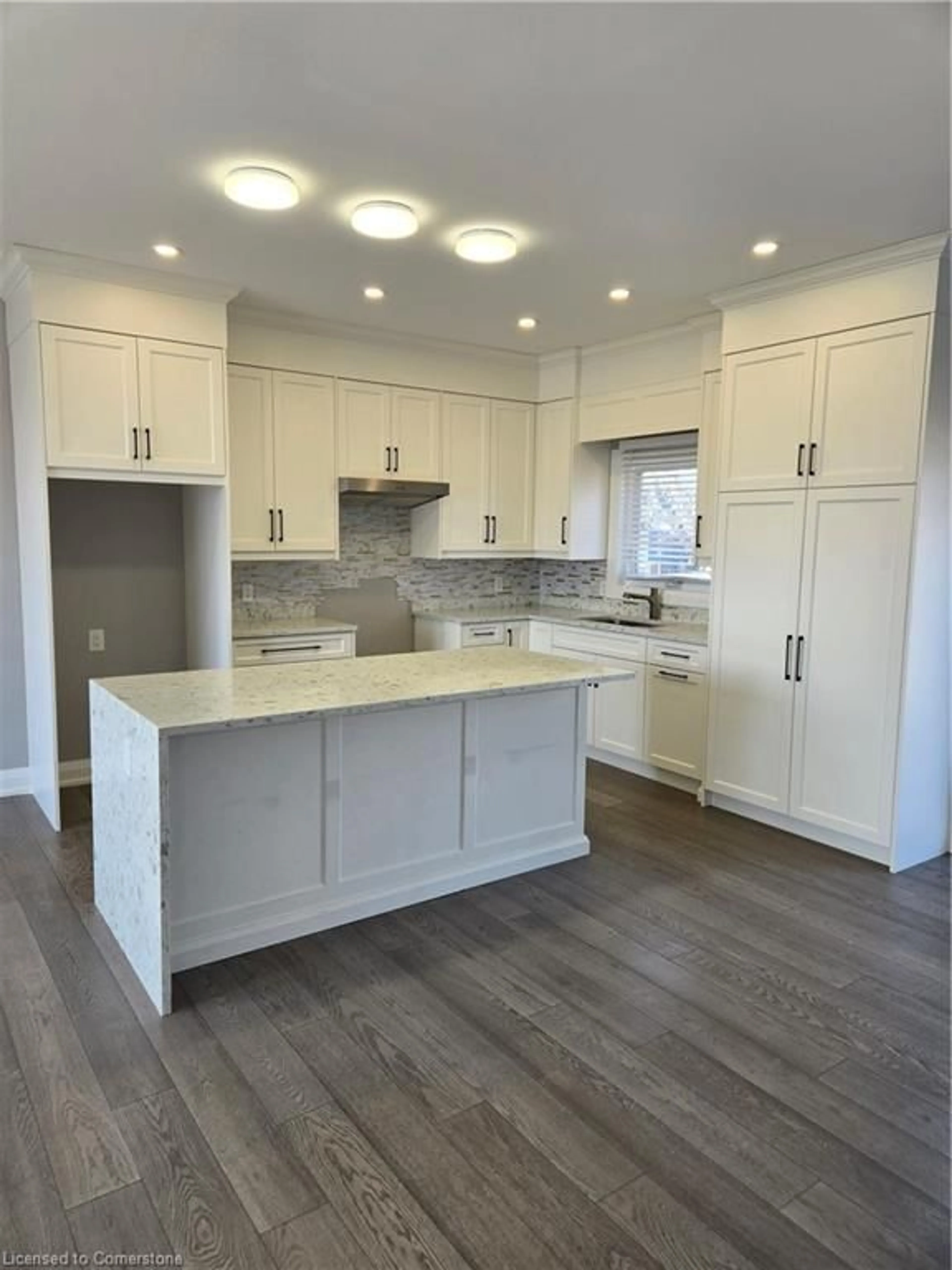 Open concept kitchen, wood/laminate floor for 41 Amelia St, Port Colborne Ontario L3K 2K8