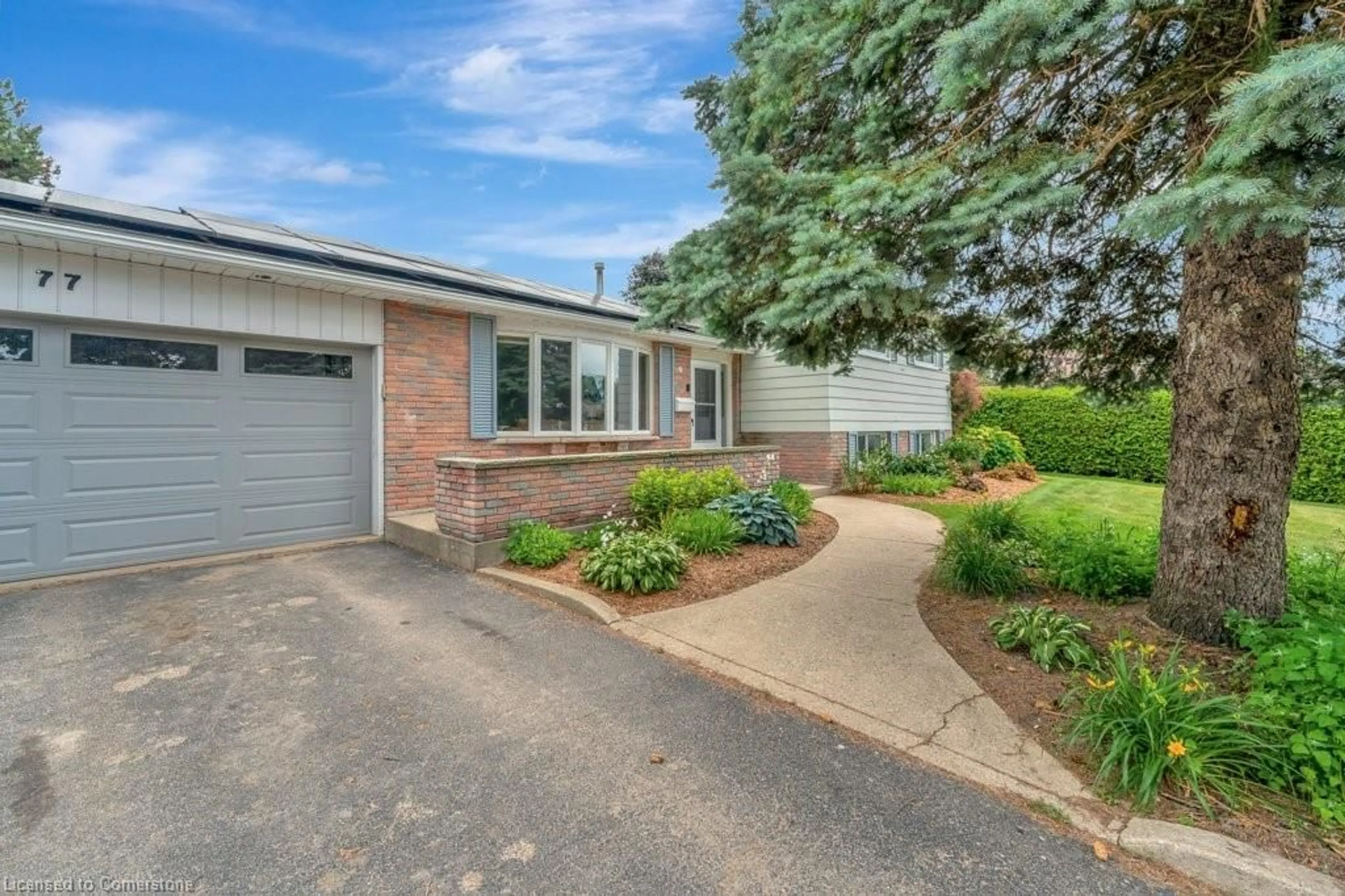 Home with brick exterior material, street for 77 Magnolia Dr, Paris Ontario N3L 3N2