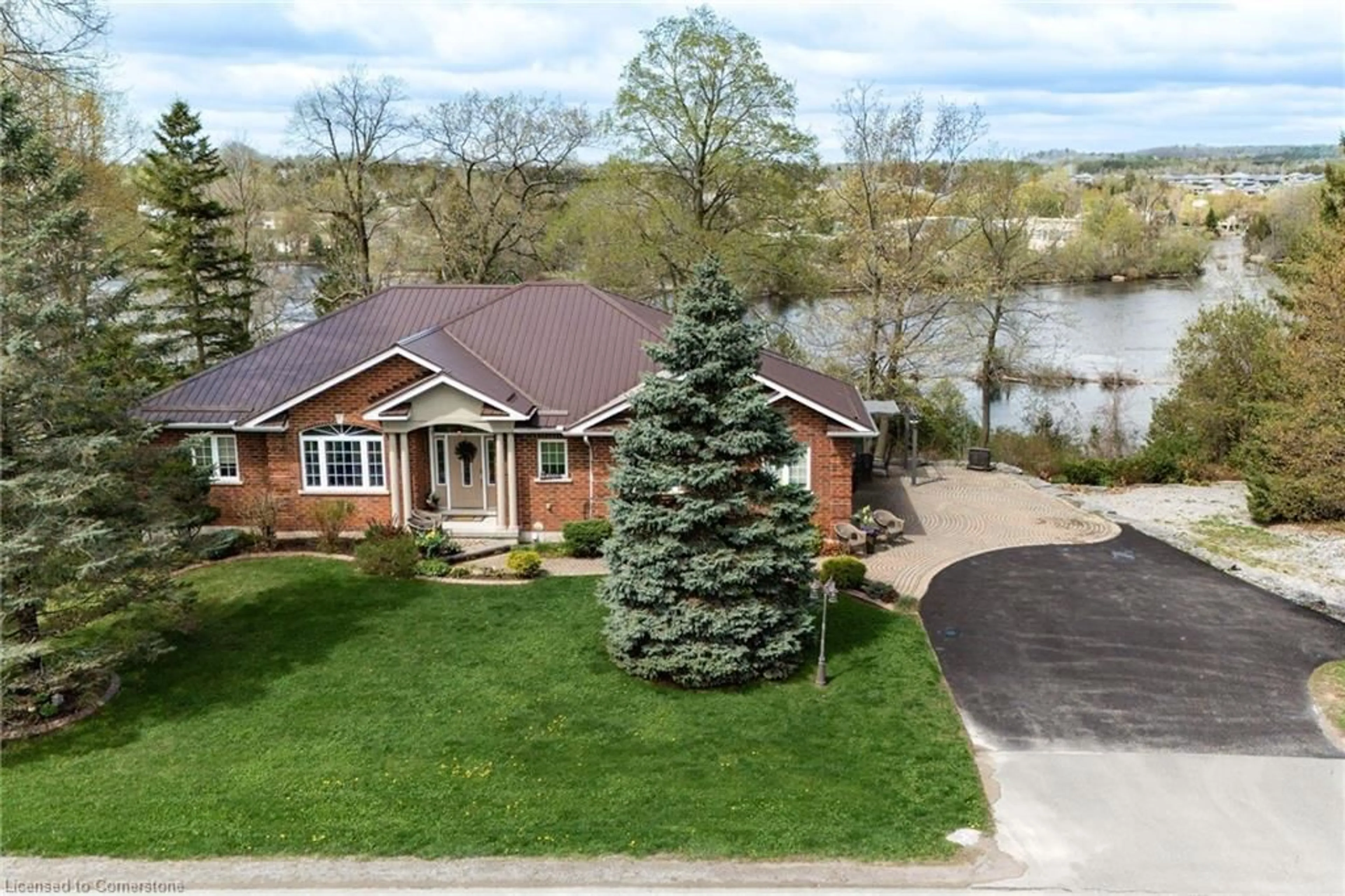 A pic from outside/outdoor area/front of a property/back of a property/a pic from drone, water/lake/river/ocean view for 127 River Dr, Frankford Ontario K0K 2C0