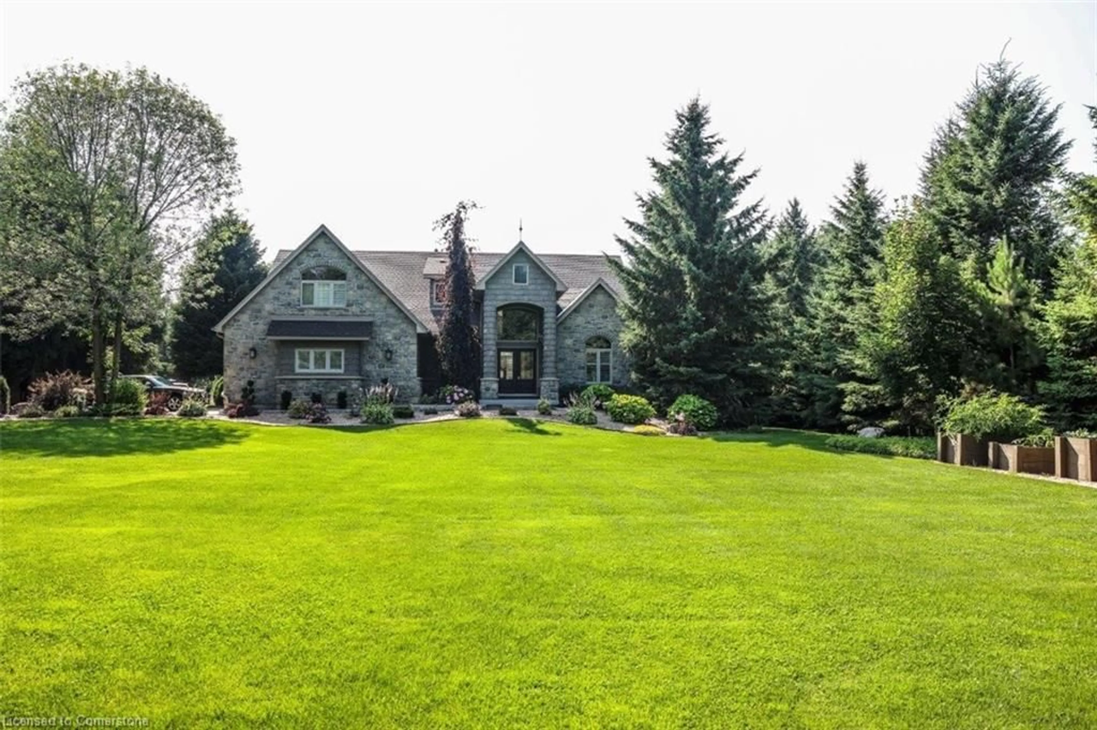 A pic from outside/outdoor area/front of a property/back of a property/a pic from drone, mountain view for 203 East River Rd, St. George Ontario N0E 1N0