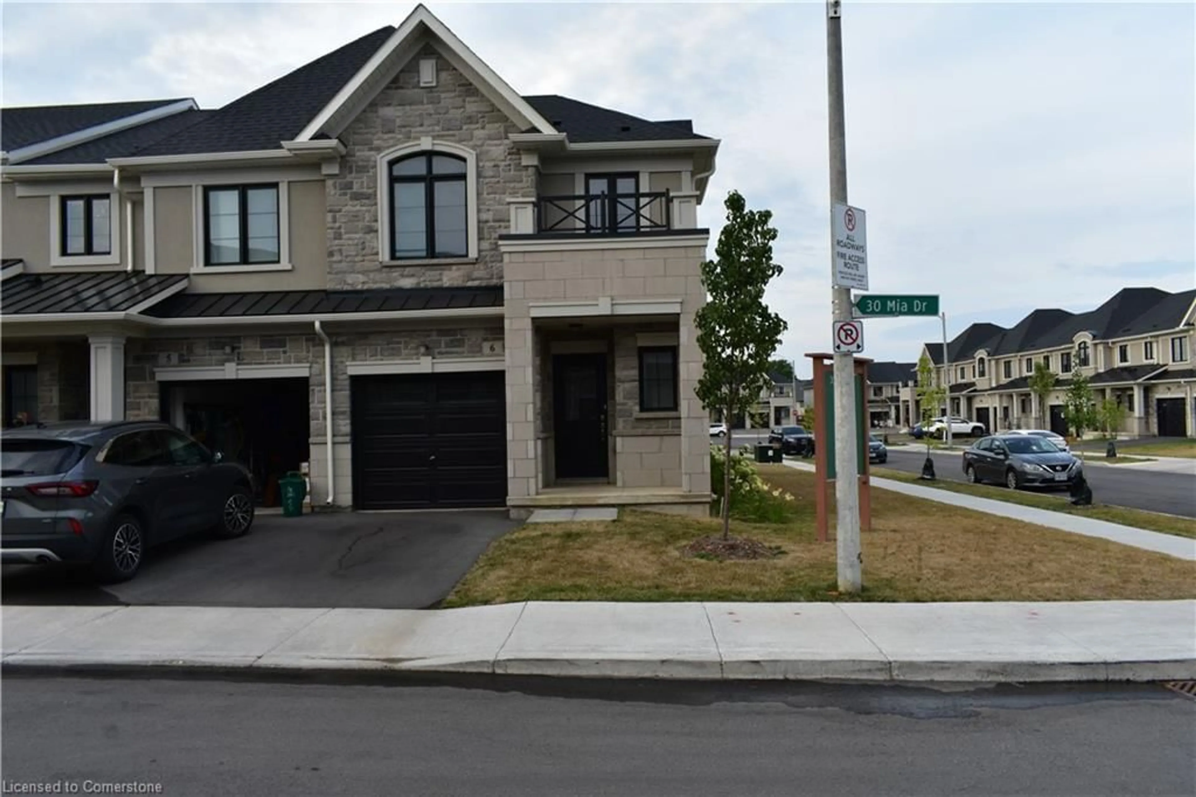 Home with brick exterior material, street for 30 Mia Dr #6, Hamilton Ontario L9B 0K1