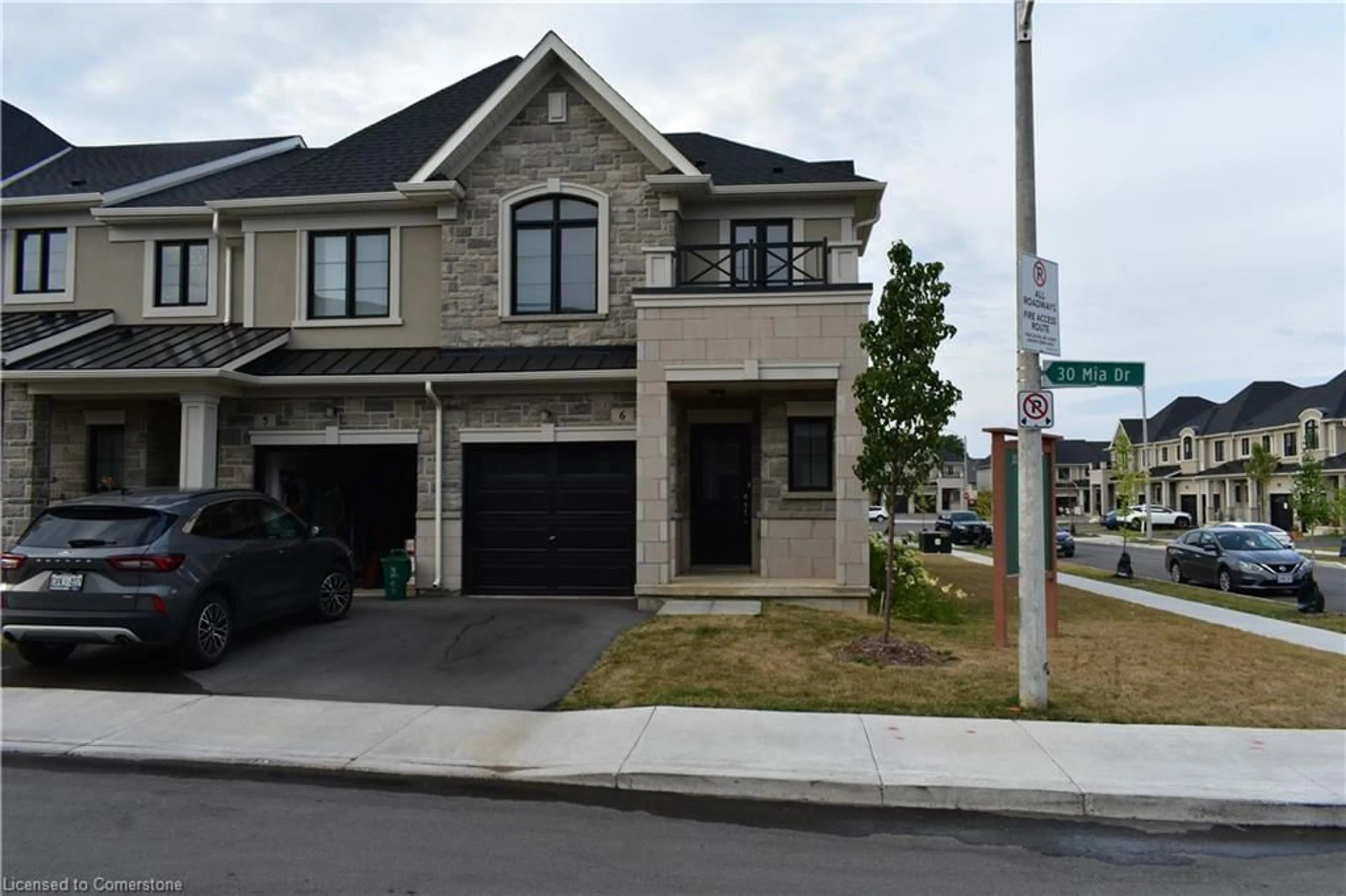 Home with brick exterior material, street for 30 Mia Dr #6, Hamilton Ontario L9B 0K1