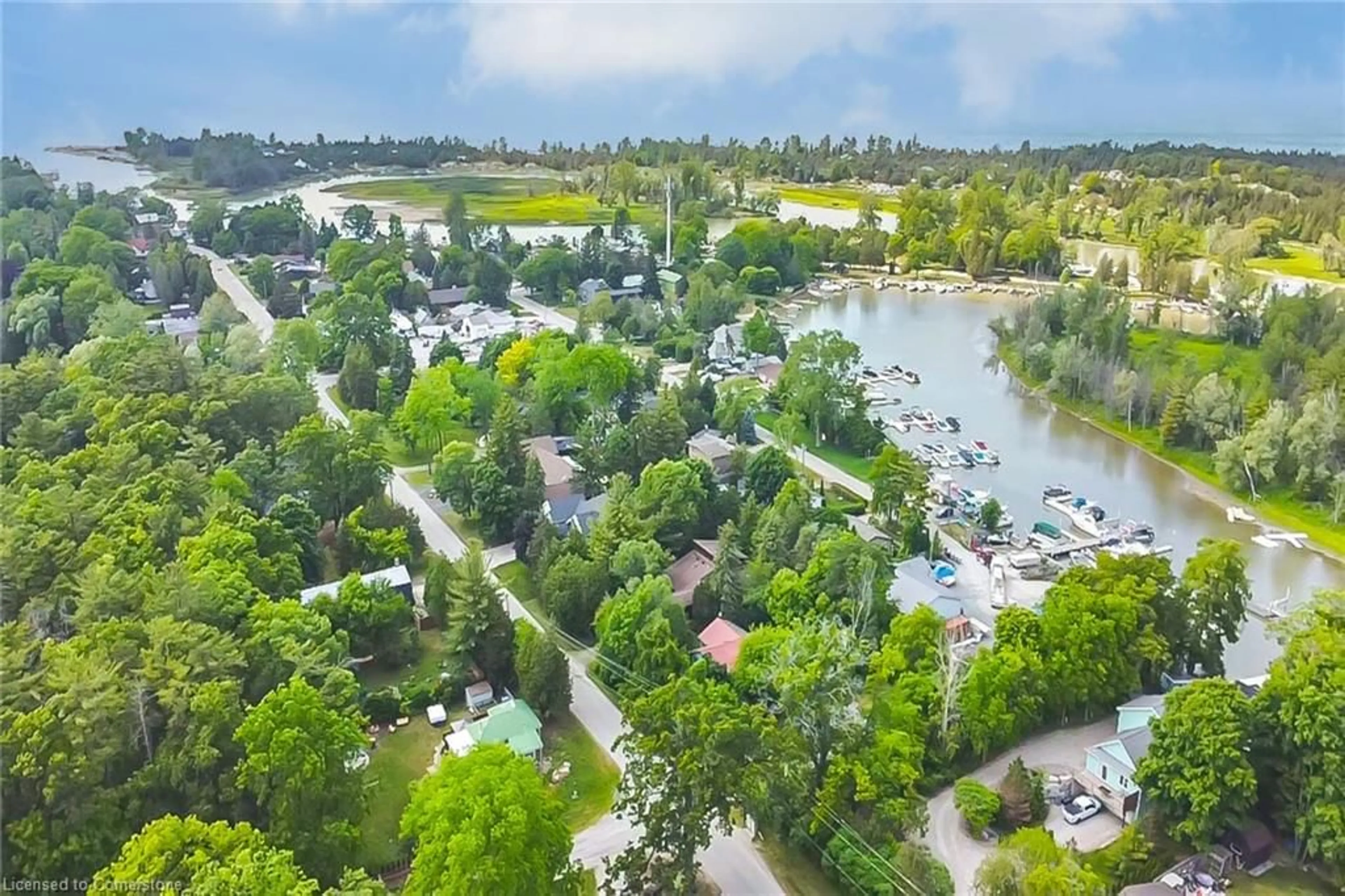 A pic from outside/outdoor area/front of a property/back of a property/a pic from drone, water/lake/river/ocean view for 7624 Riverside Dr, Port Franks Ontario N0M 2L0